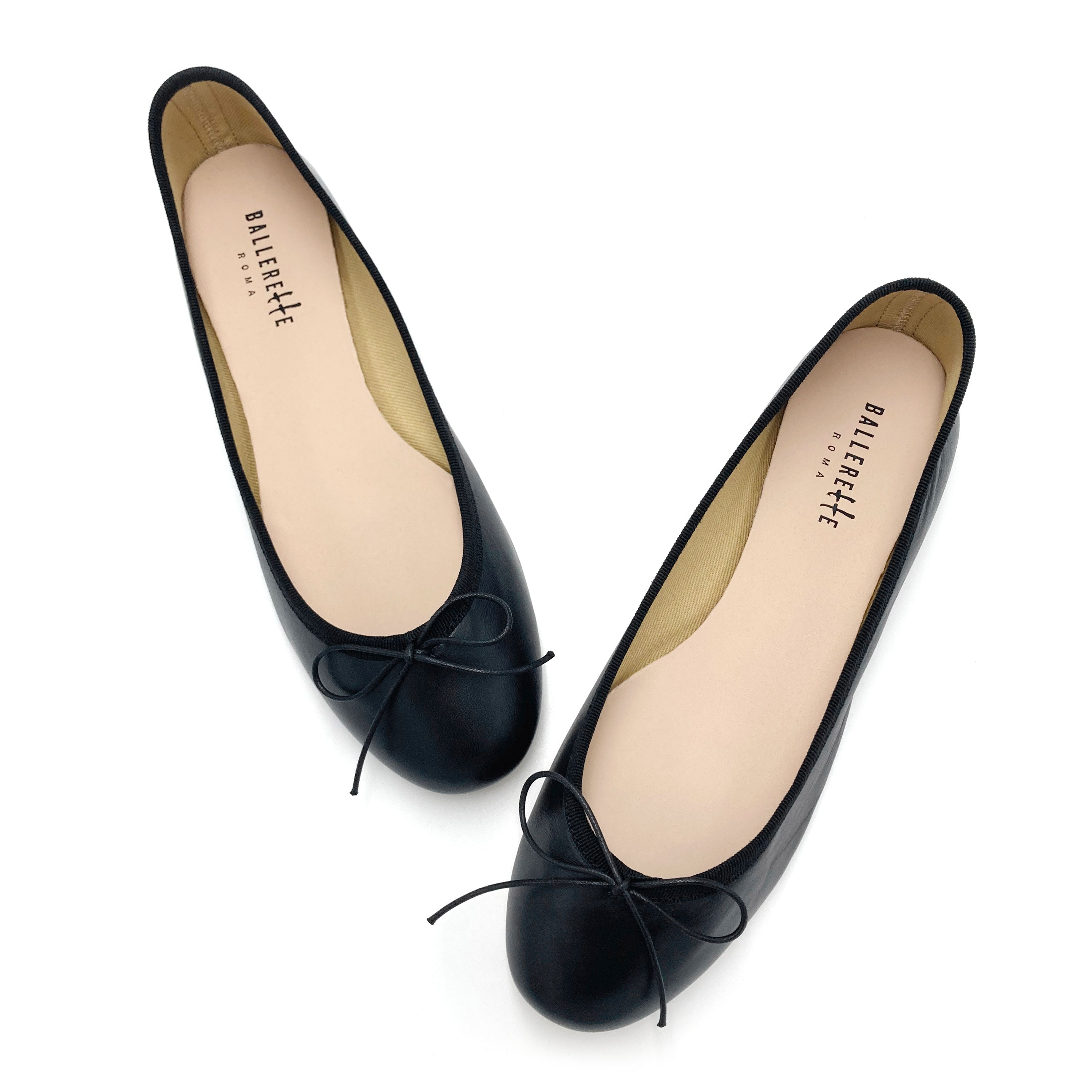 Black leather ballet flats