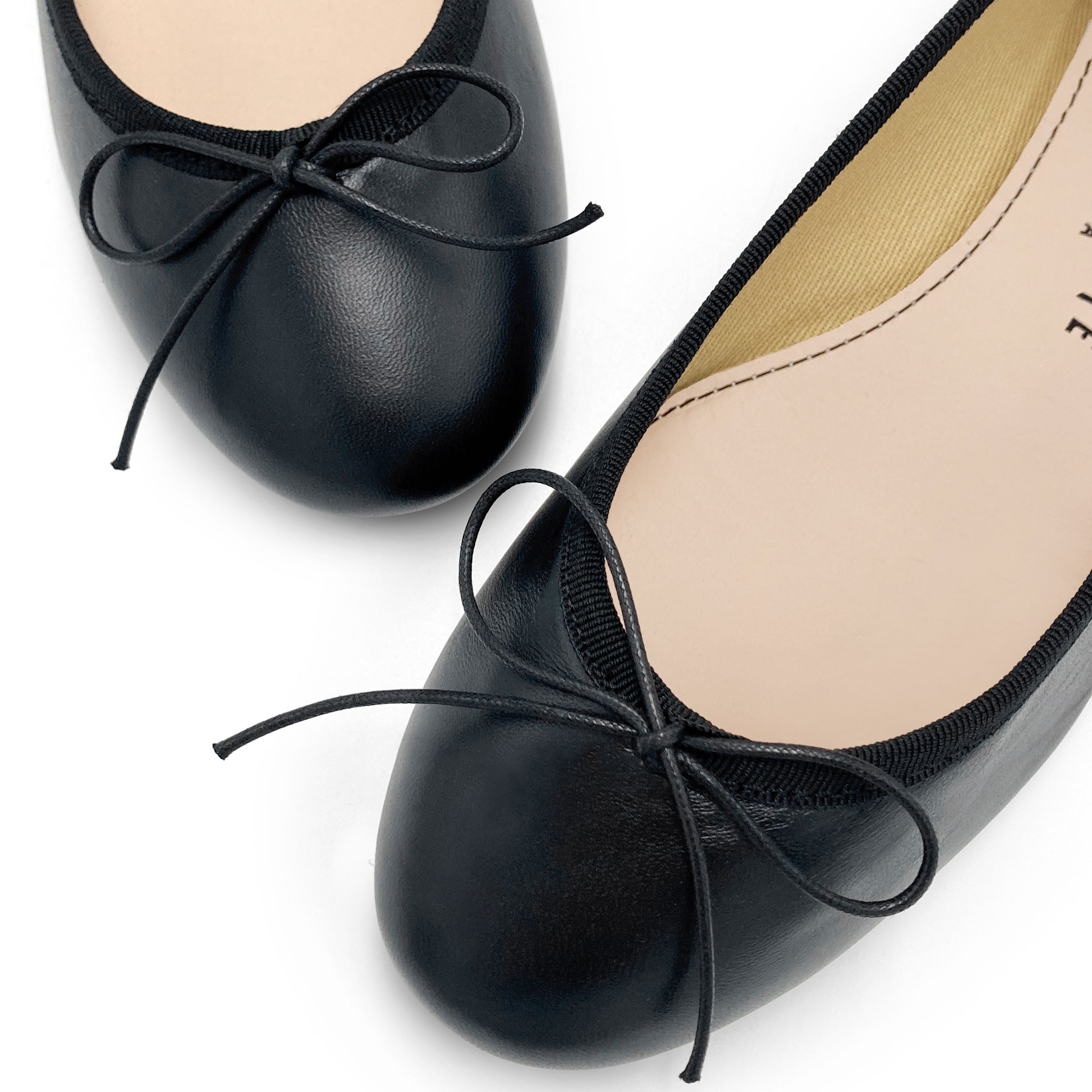 Black leather ballet flats