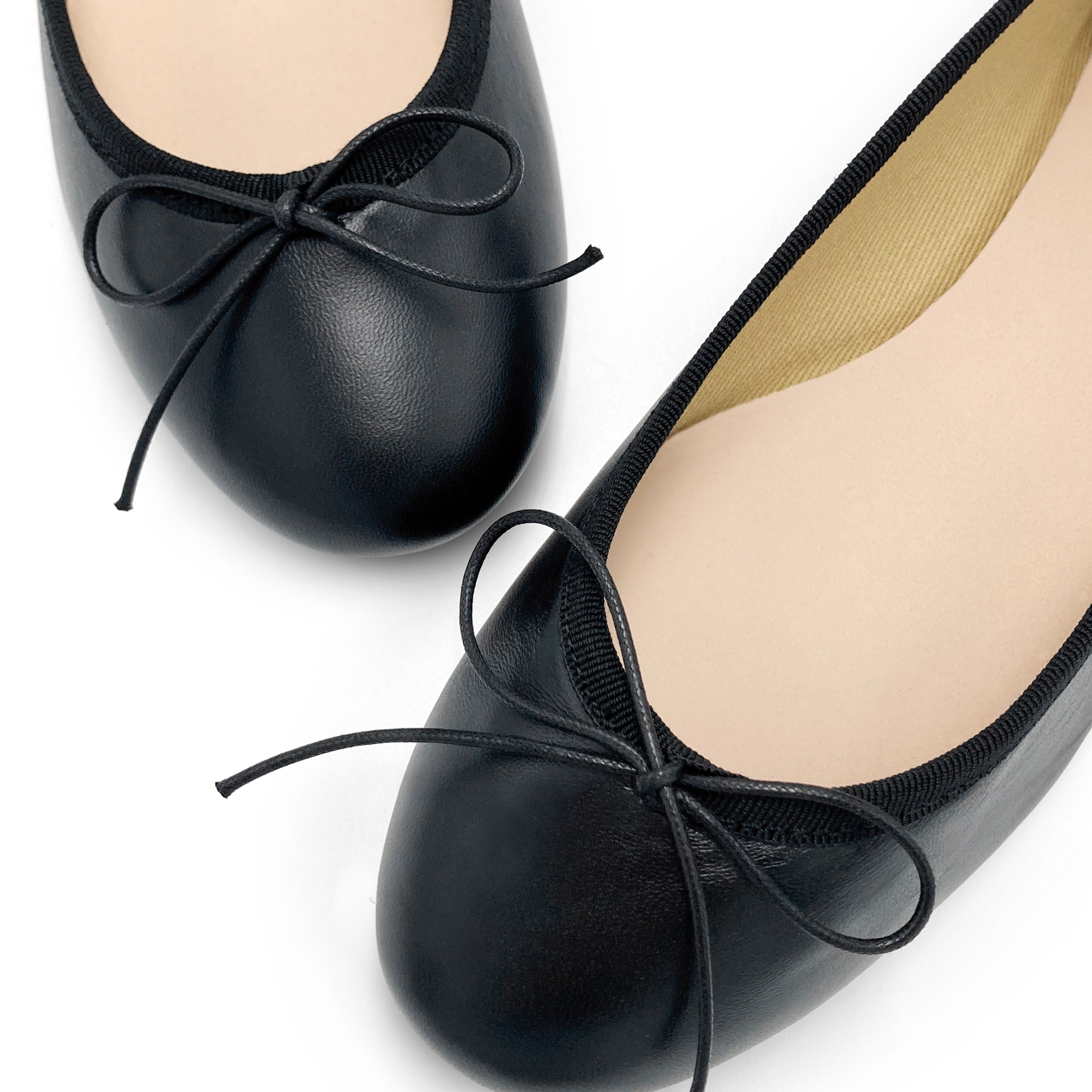 Black leather ballet flats