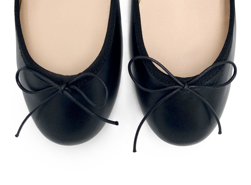 Black leather ballet flats