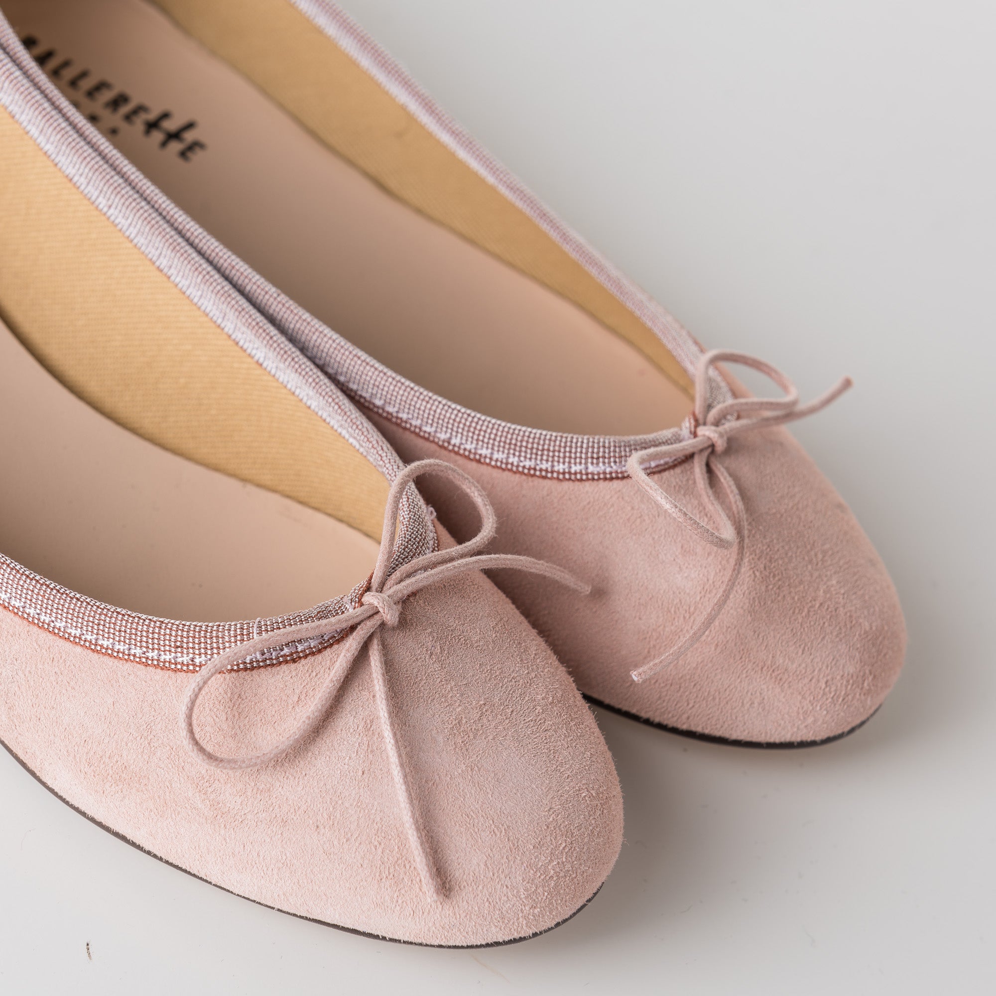 Pink suede ballet flats