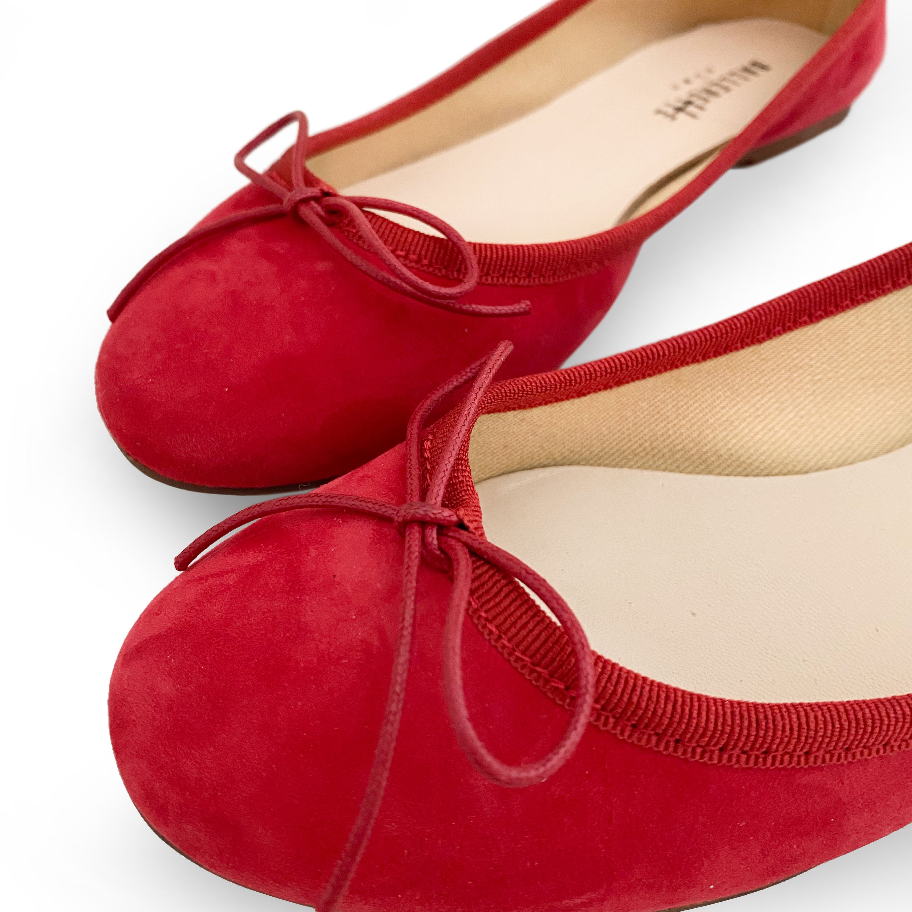 Red suede ballet flats