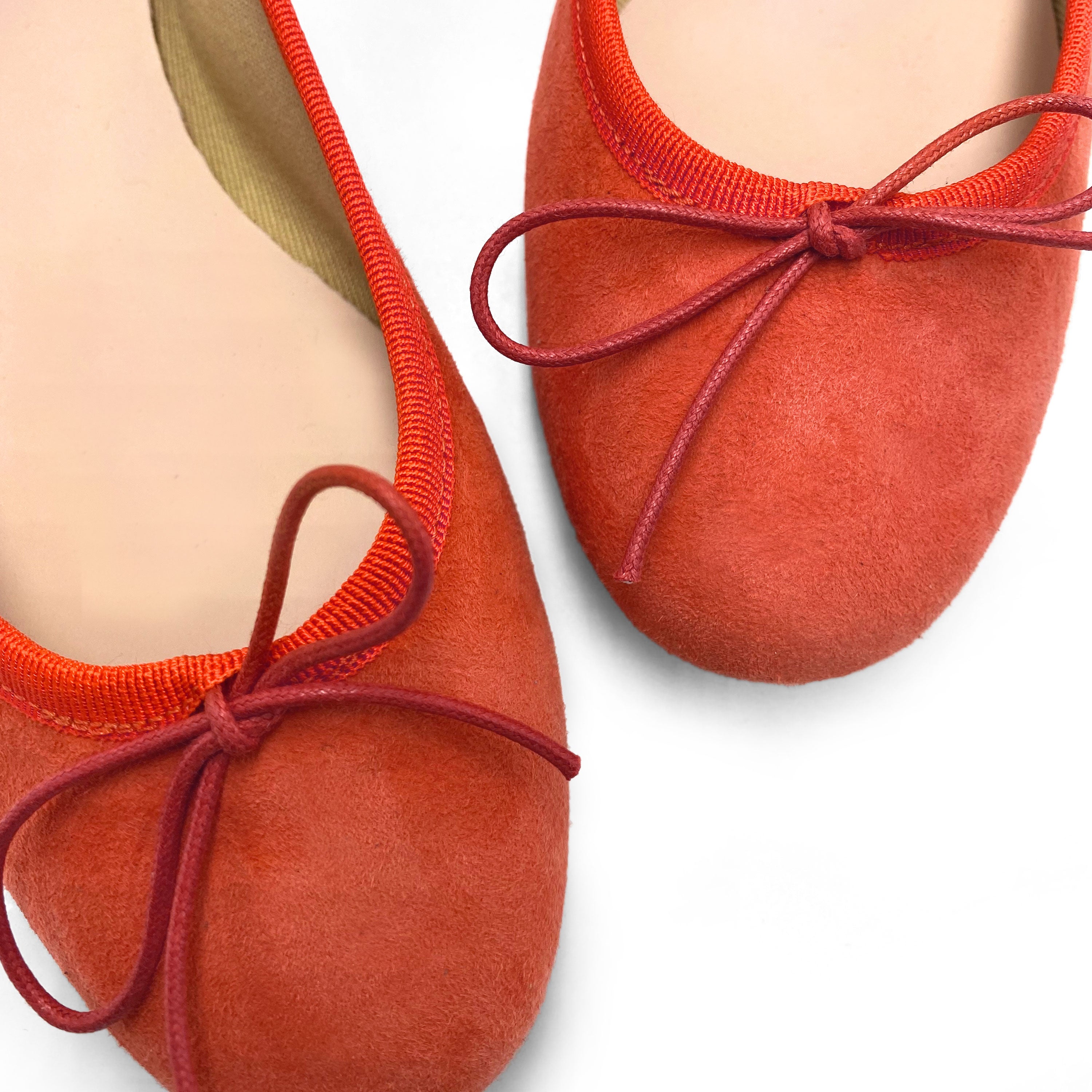 Pumpkin orange suede ballet flats