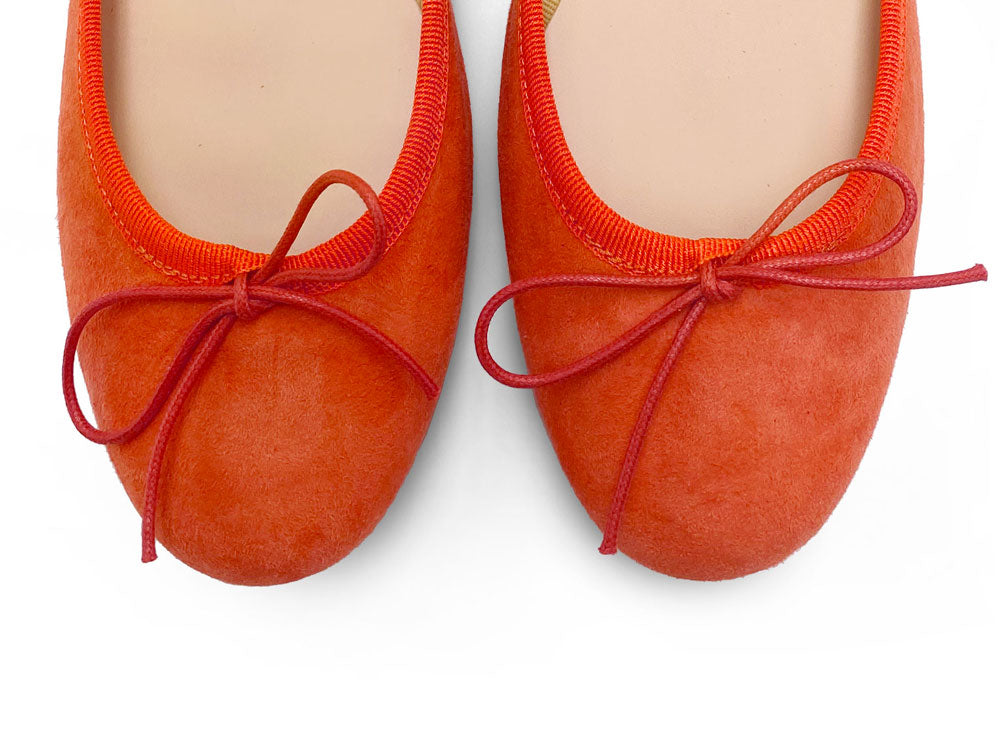 Pumpkin orange suede ballet flats