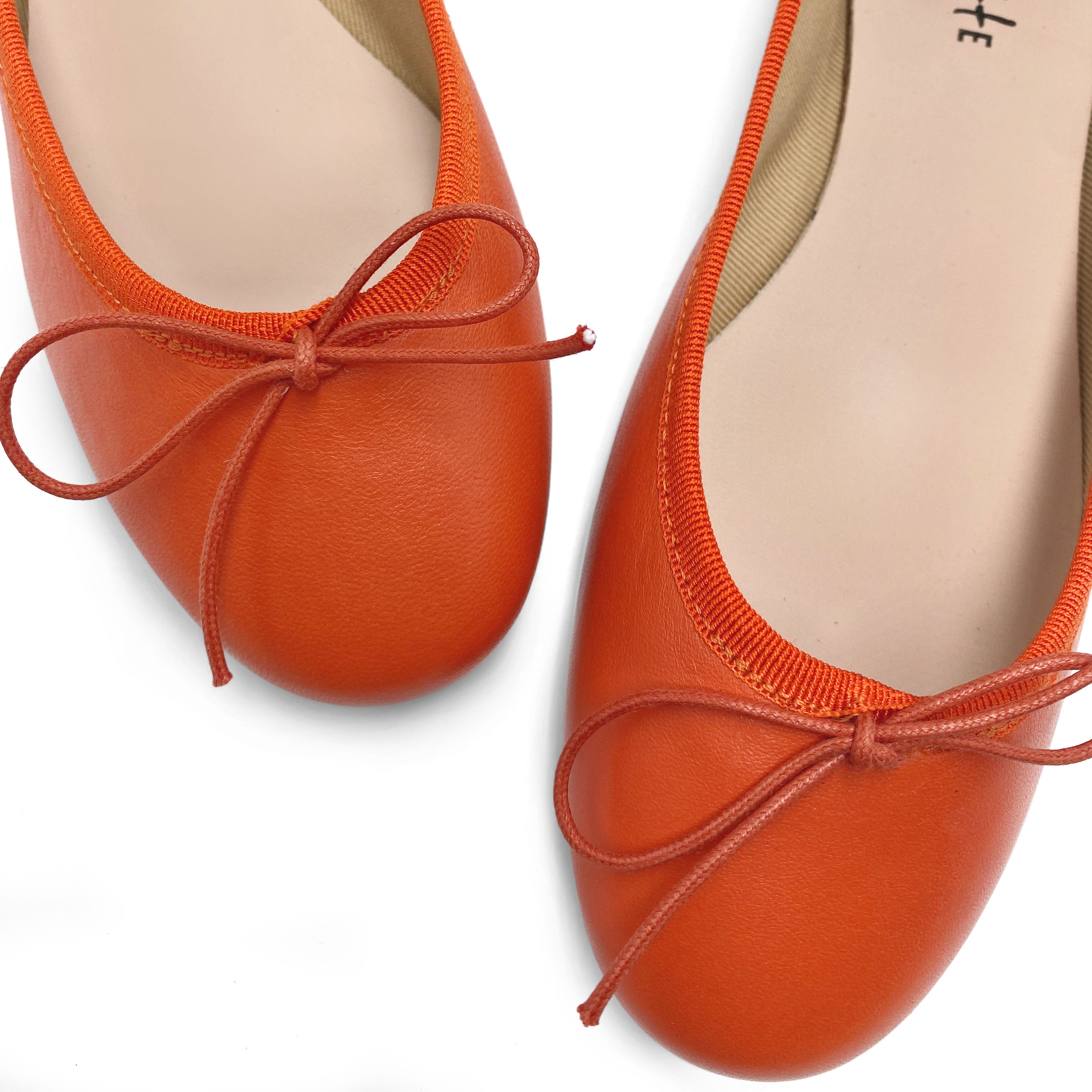 Pumpkin orange leather ballet flats