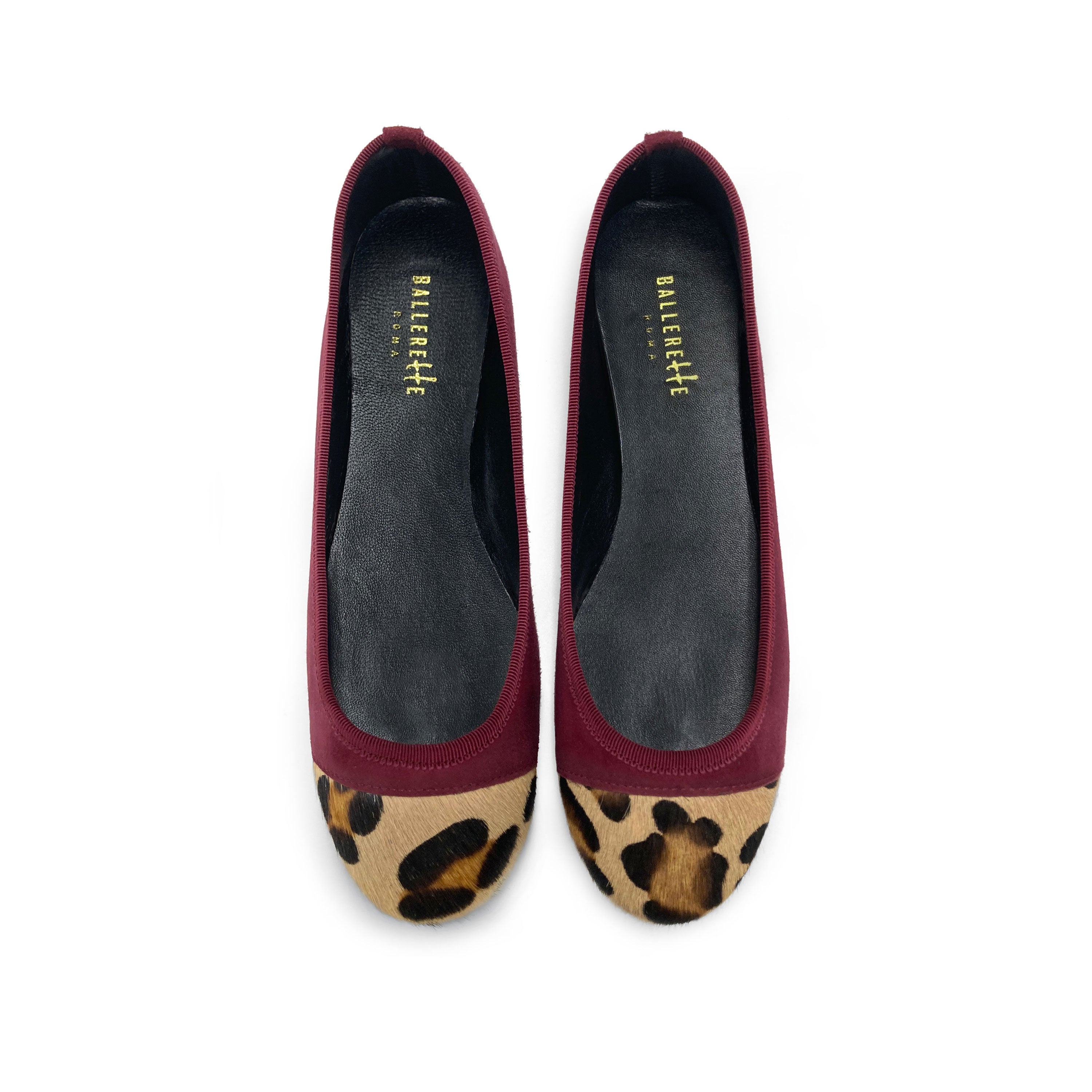 Burgundy suede ballet flats with animal print toe