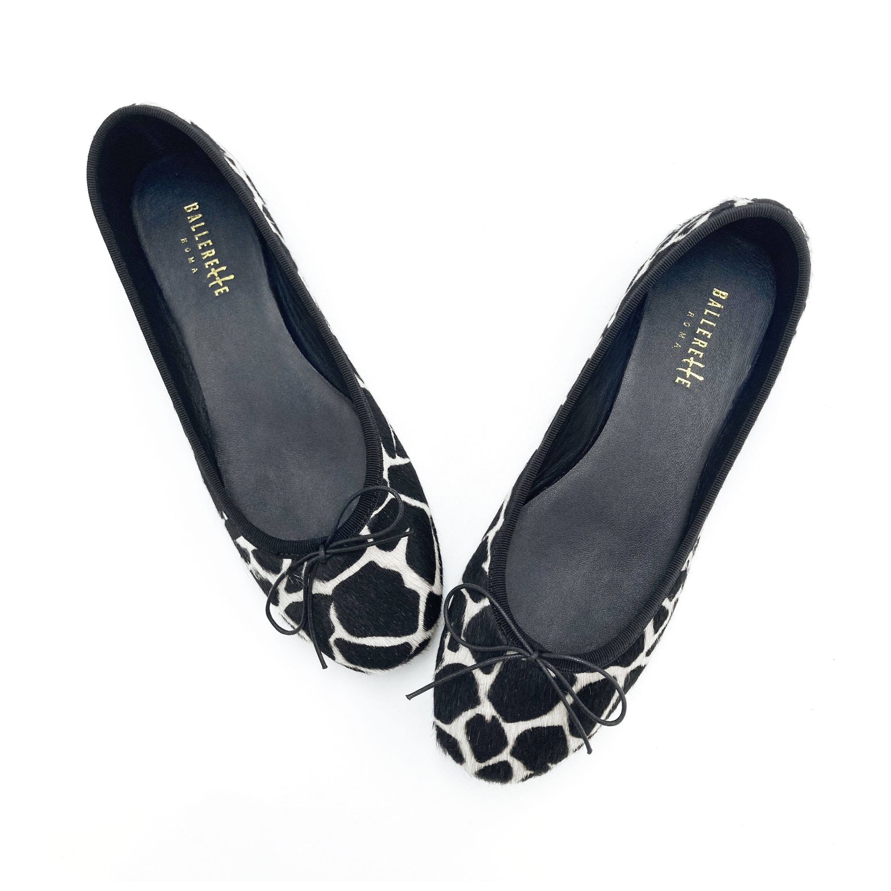 Black and white animal print ballet flats