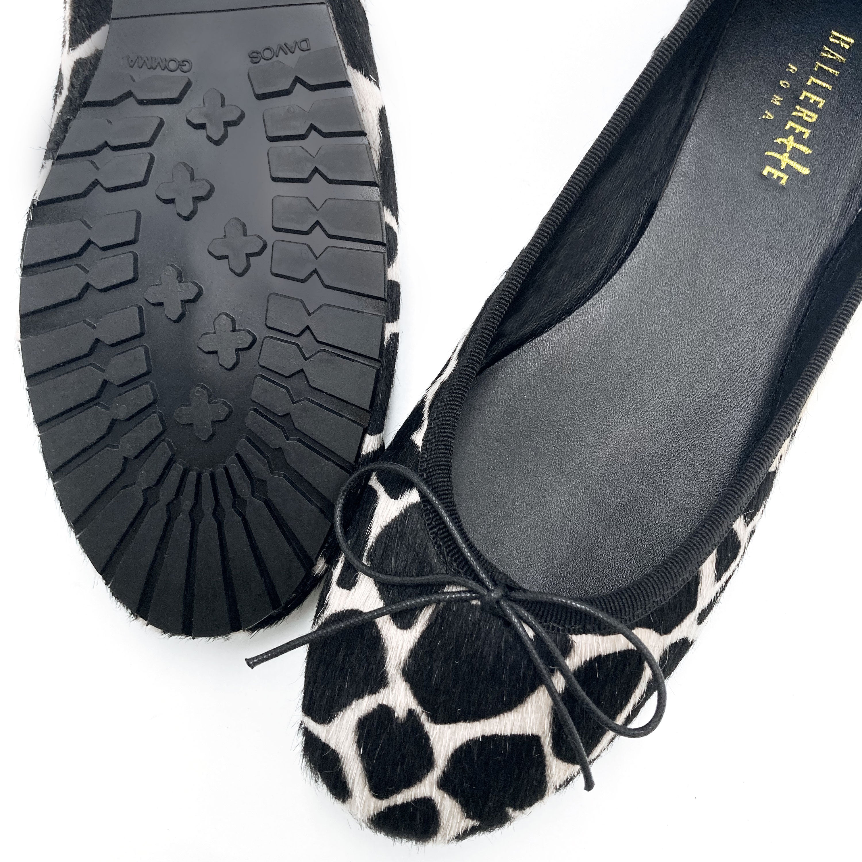 Black and white animal print ballet flats