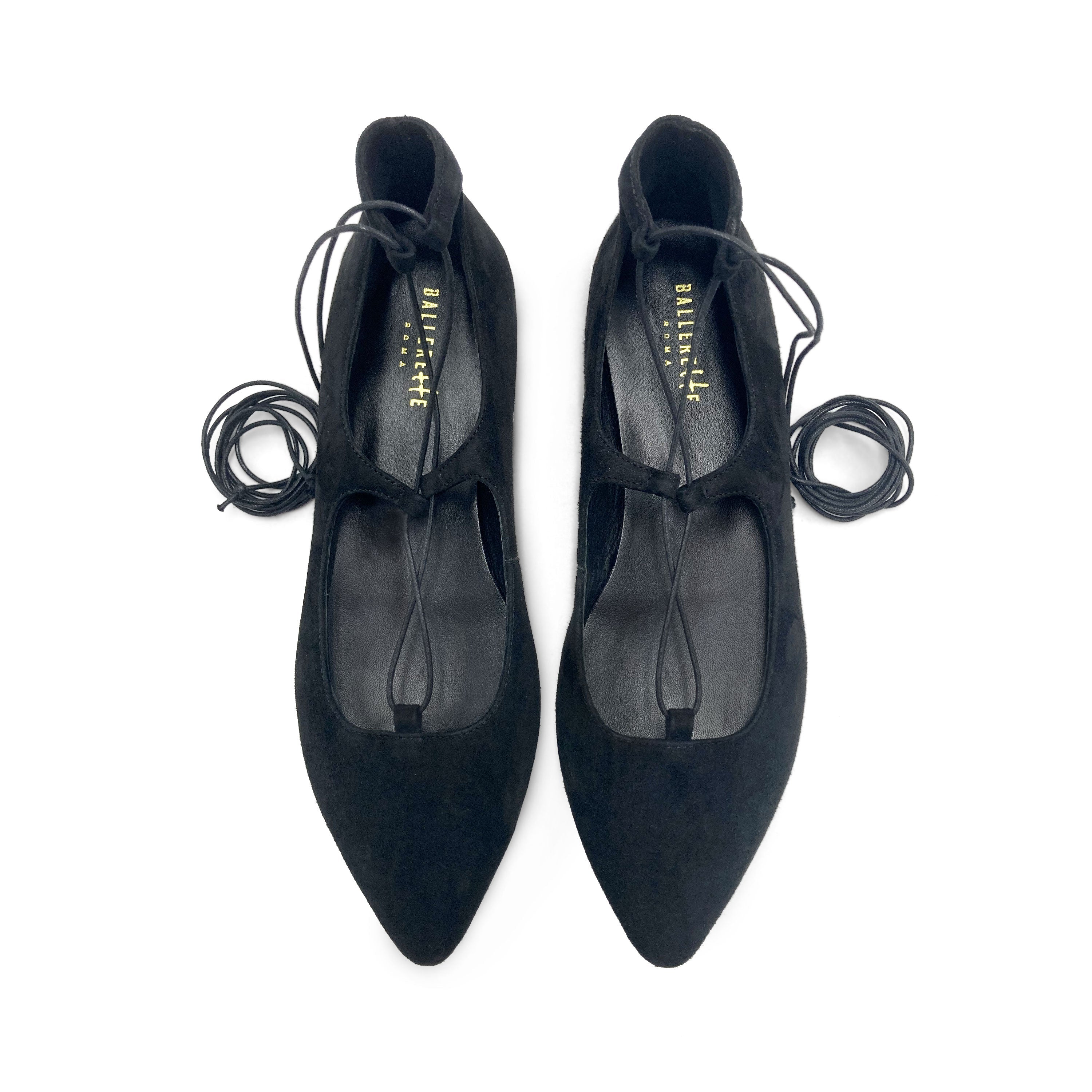 Black suede ballet flats with straps