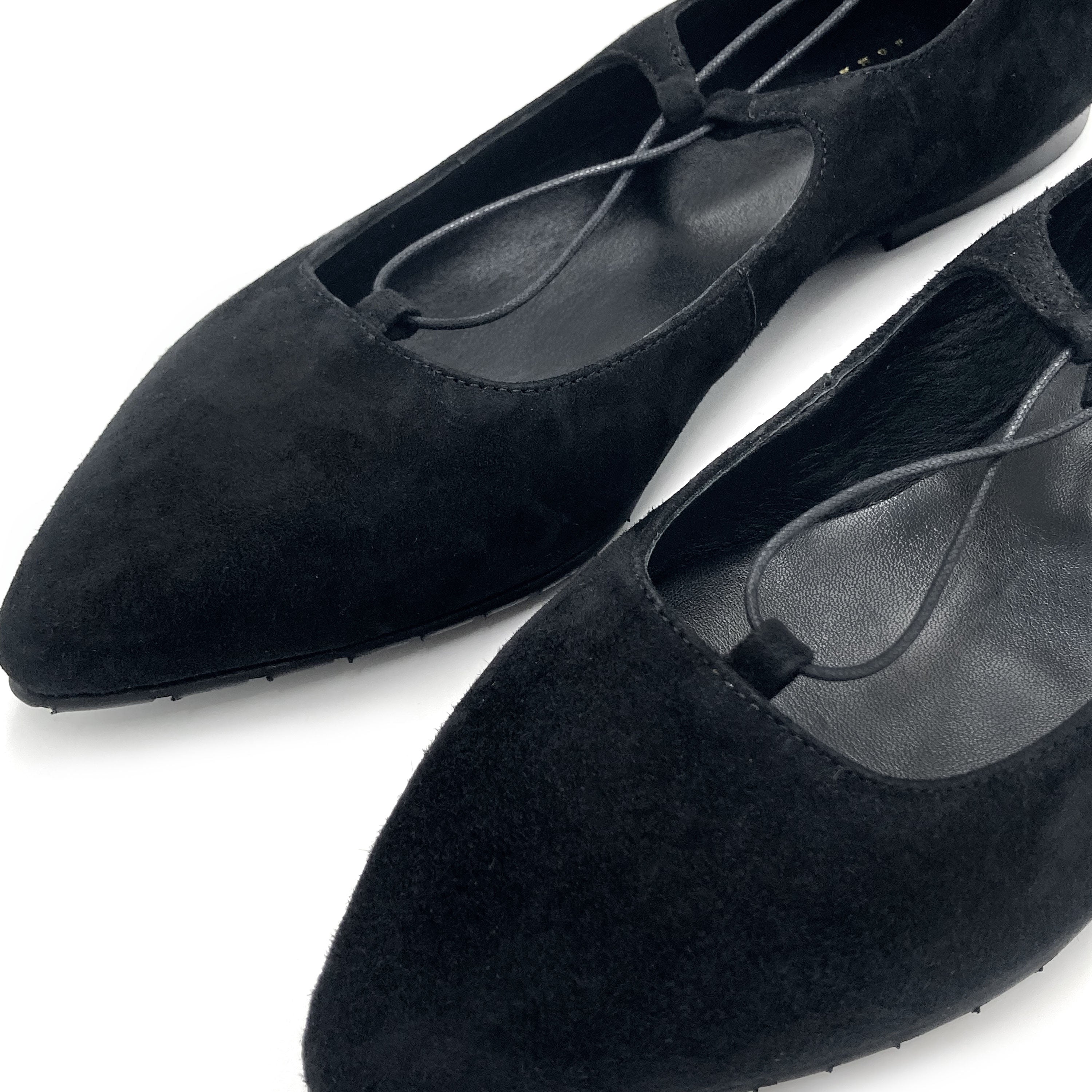 Black suede ballet flats with straps