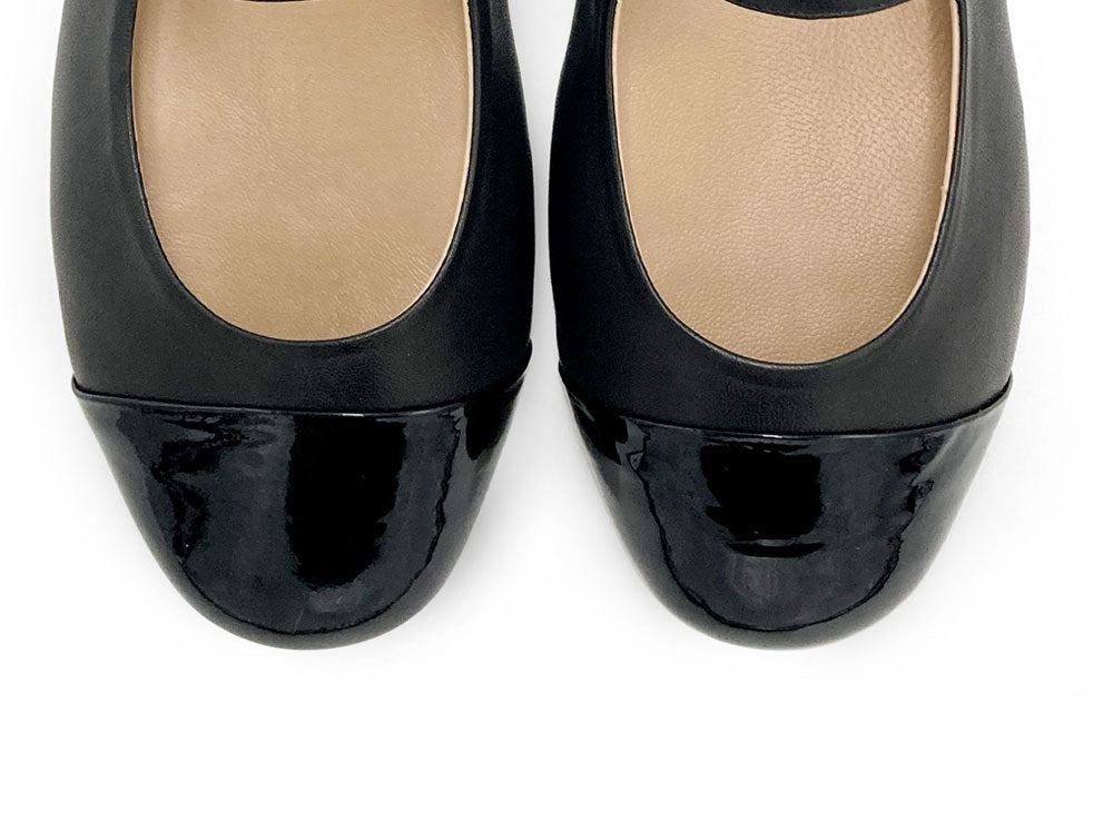 Black ballet flats with black patent toe and strap