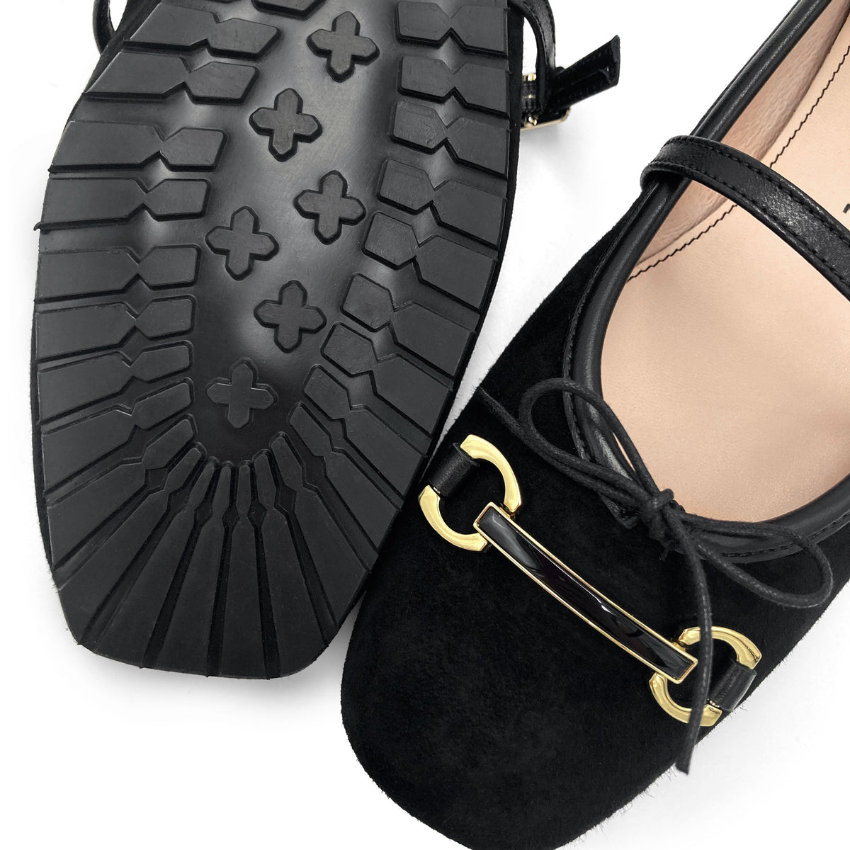 Black suede Mary Jane ballet flats with a metal clasp