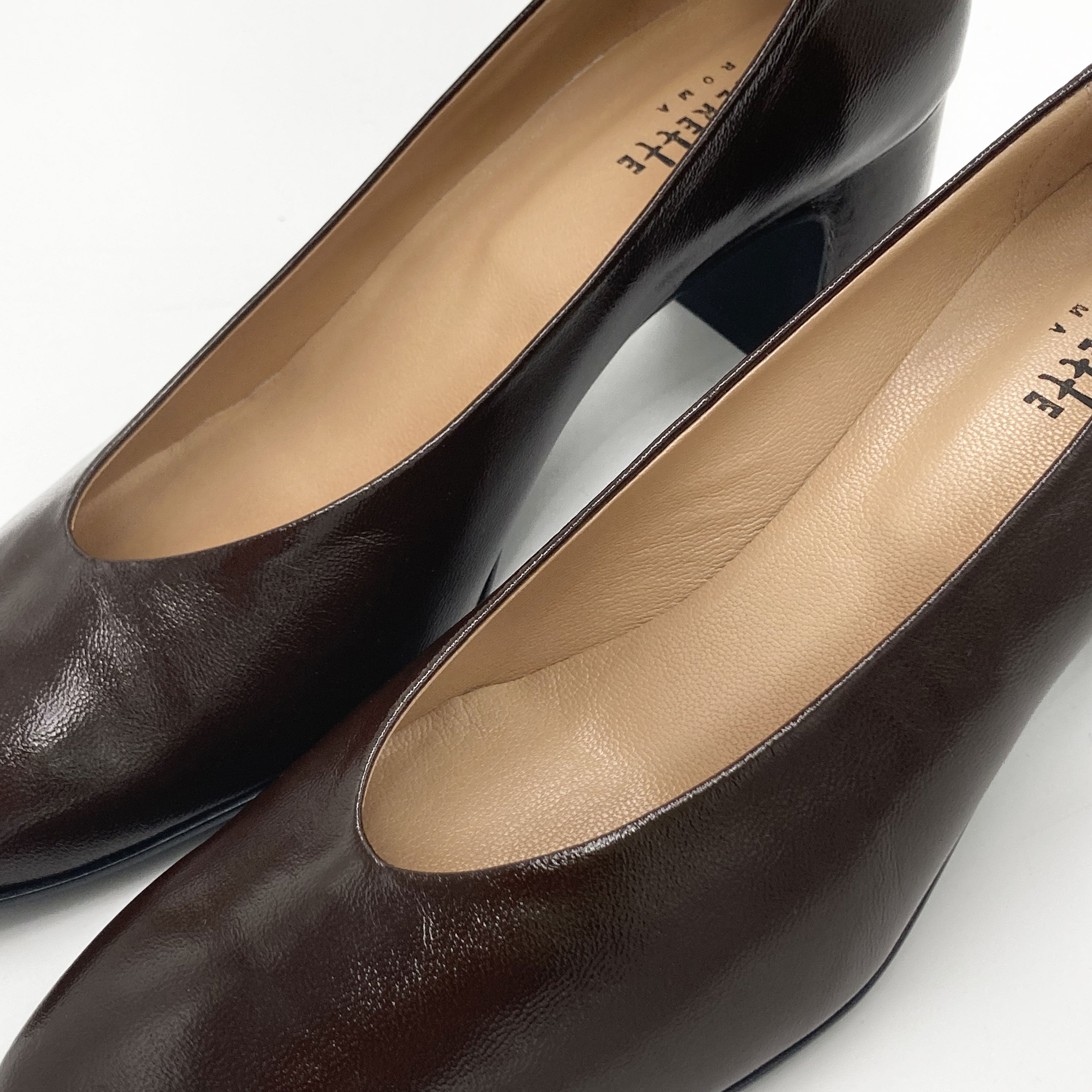 Brown patent leather ballet flats with square toe and comfortable high heel