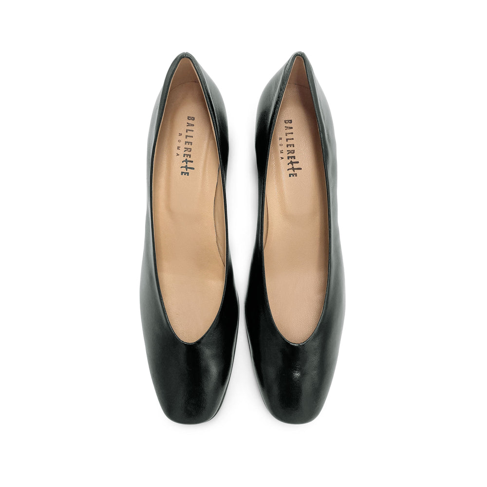 Black patent leather ballet flats with square toe and comfortable high