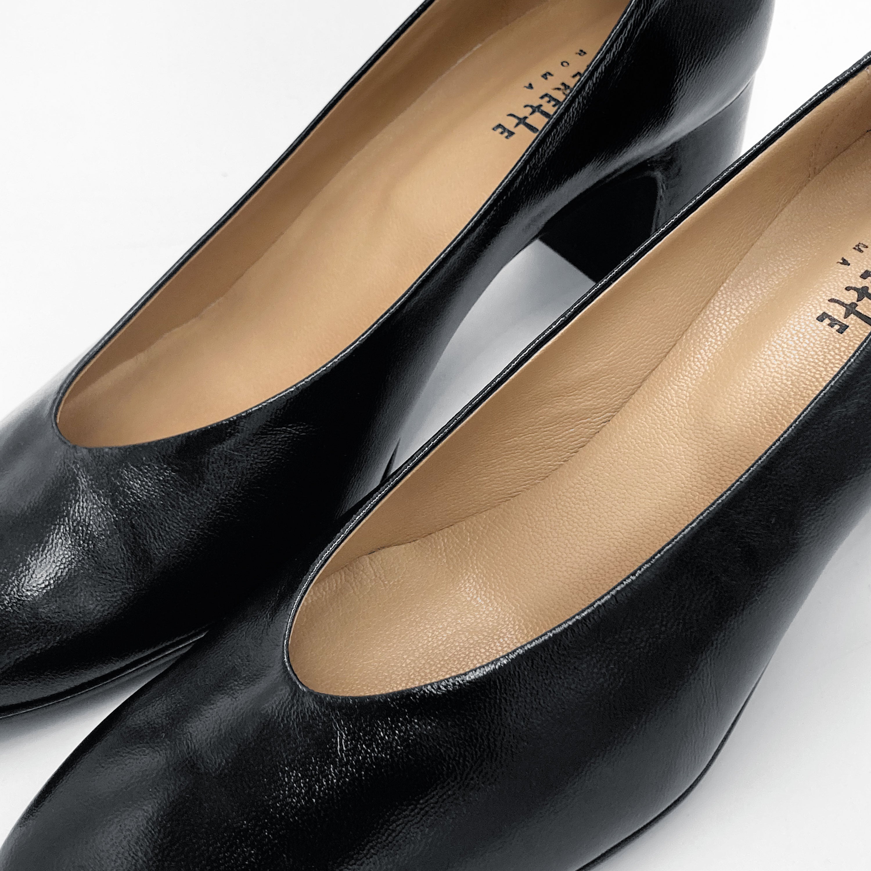Black patent leather ballet flats with square toe and comfortable high heel