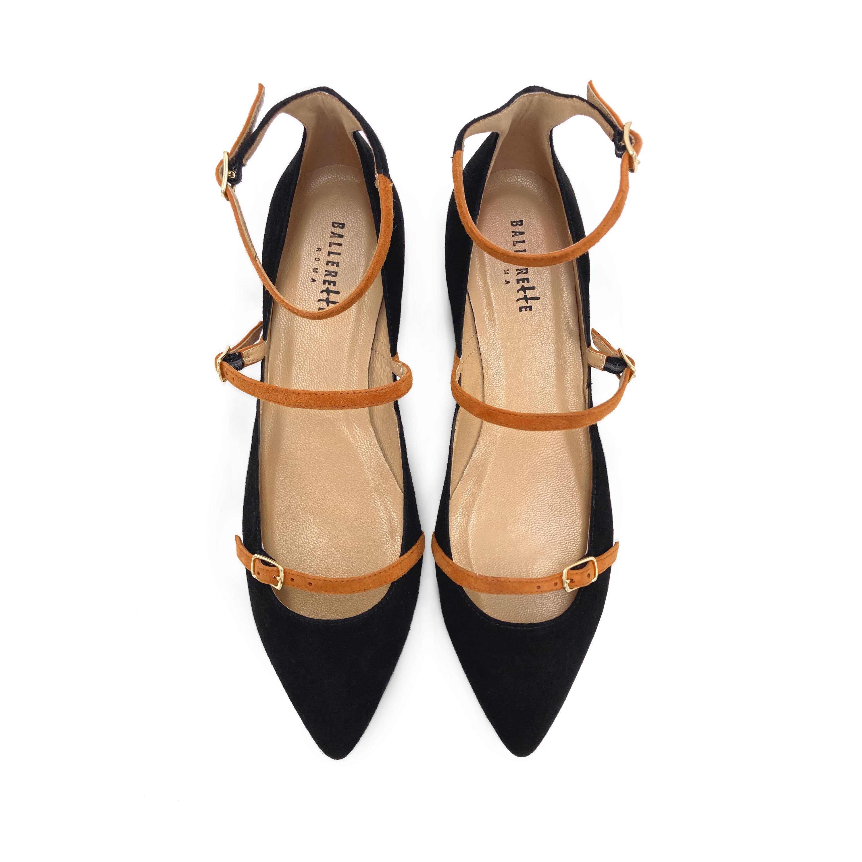 Black suede pointed ballet flats with biscuit-colored straps