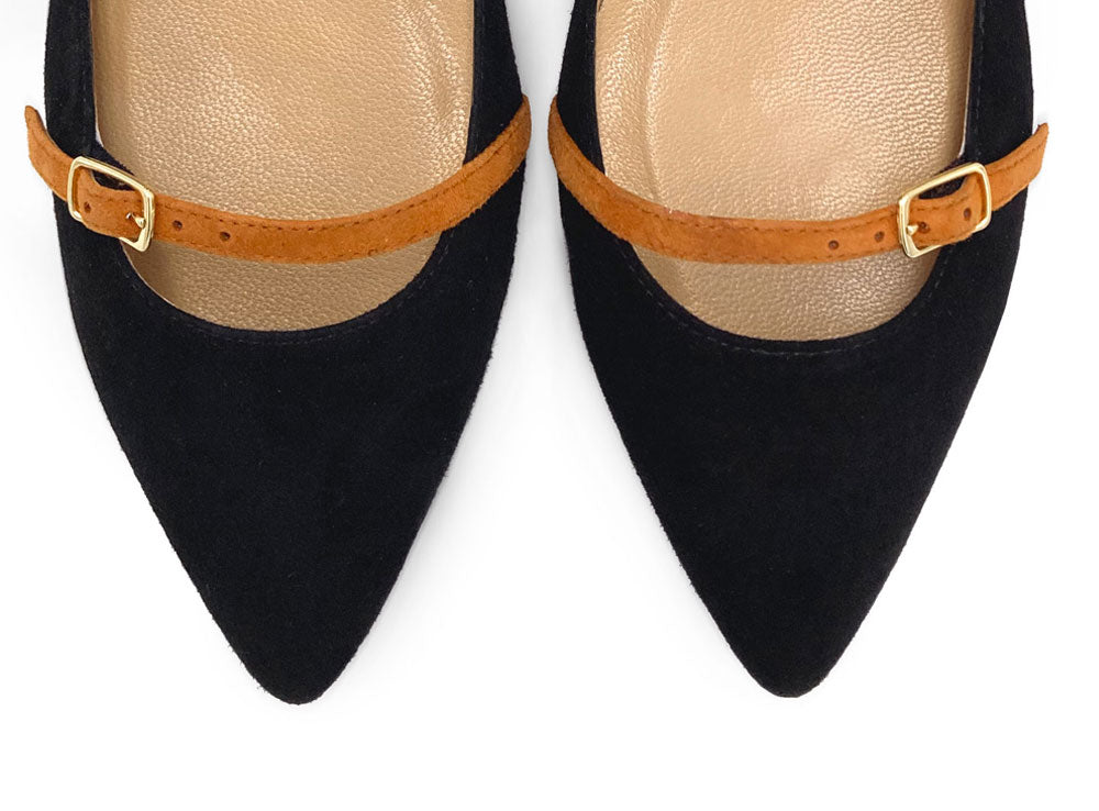 Black suede pointed ballet flats with biscuit-colored straps