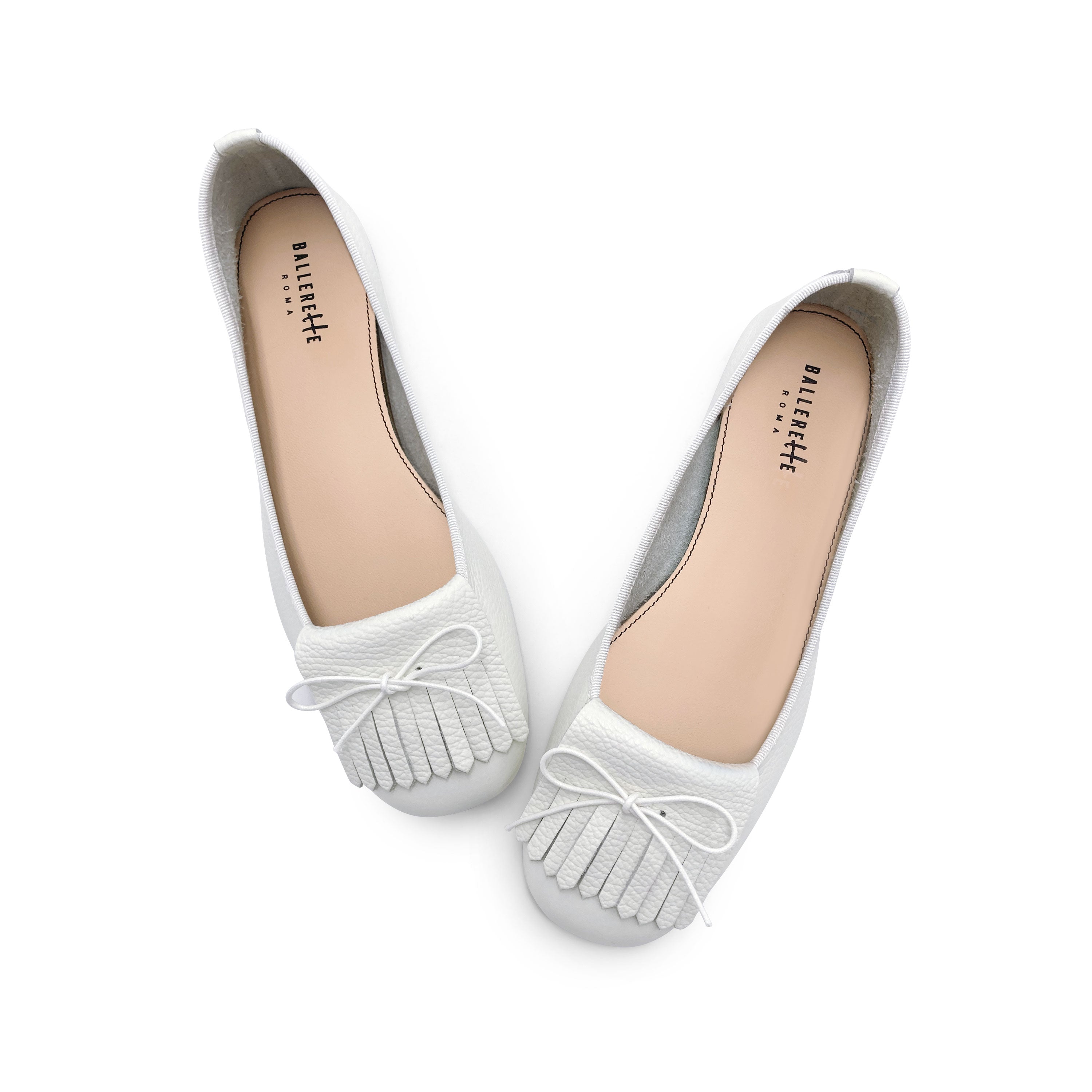 White leather moccasins with fringe