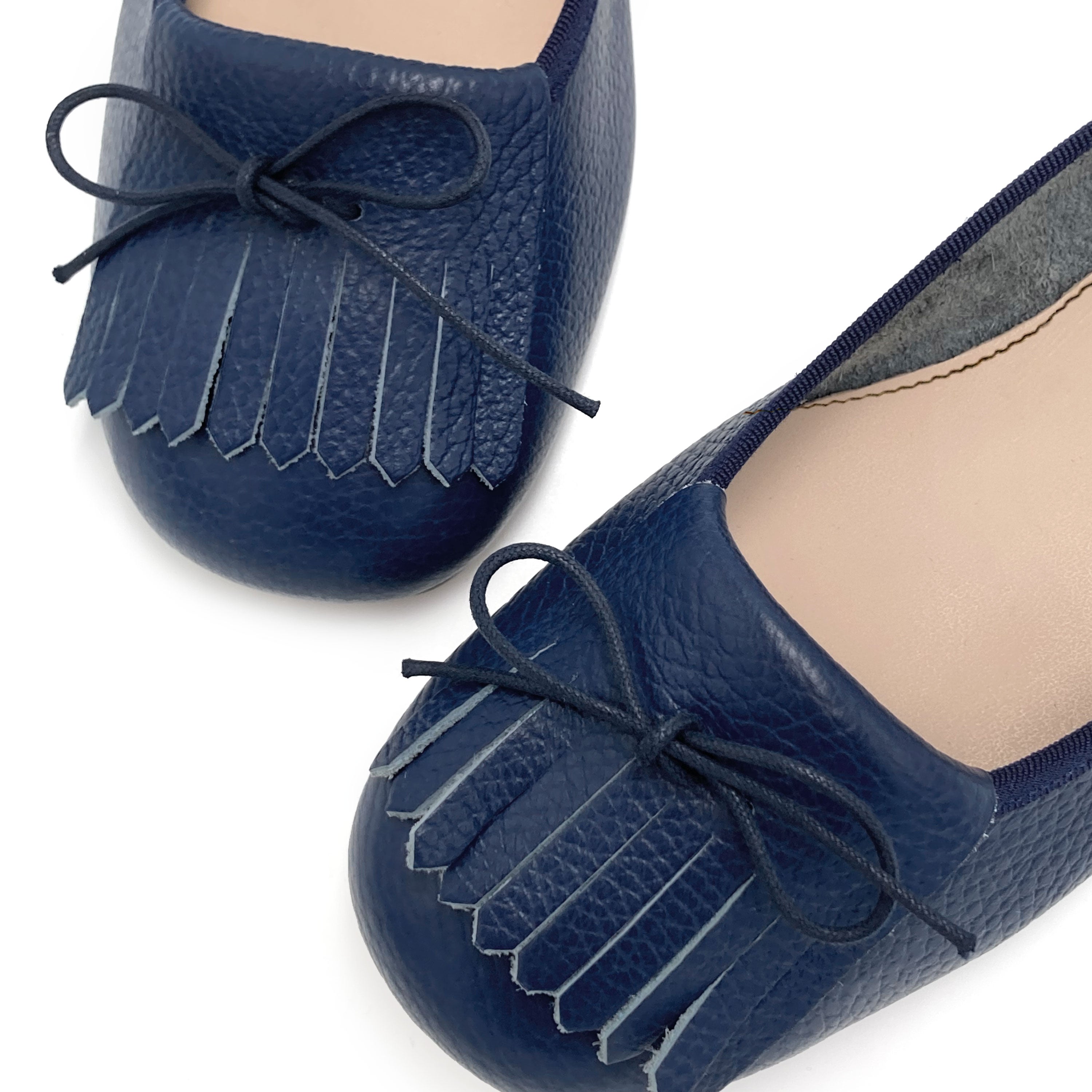 Blue leather moccasins with fringe