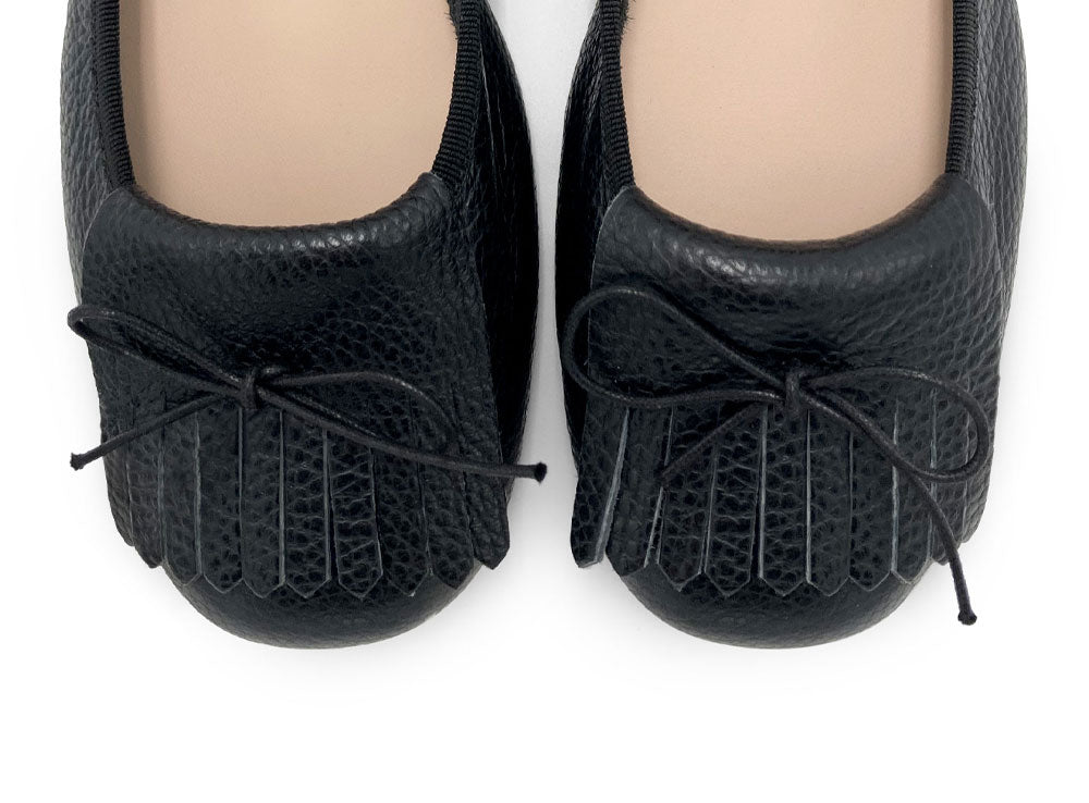 Black leather moccasins with fringe tassel