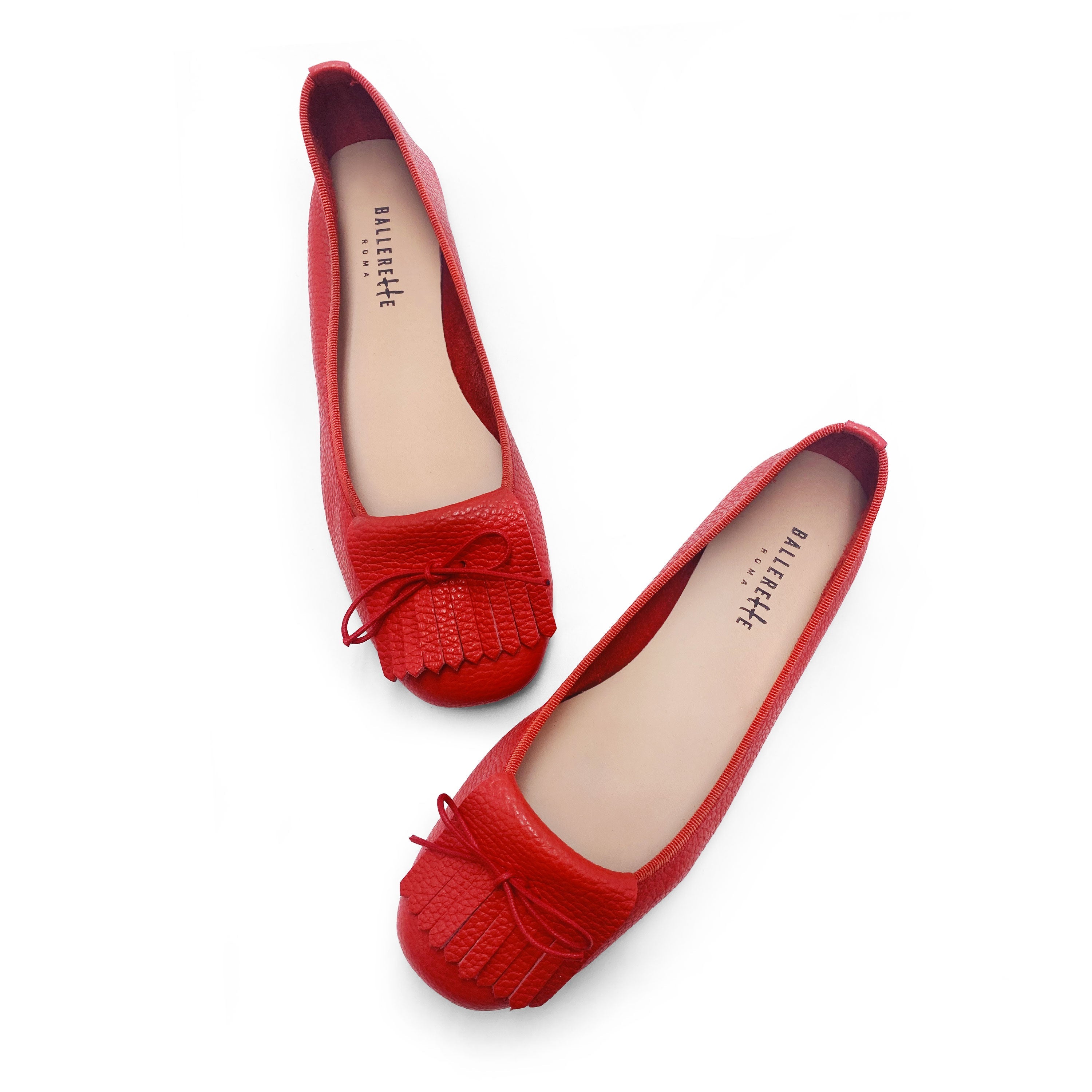 Women's strawberry red leather moccasins with fringes