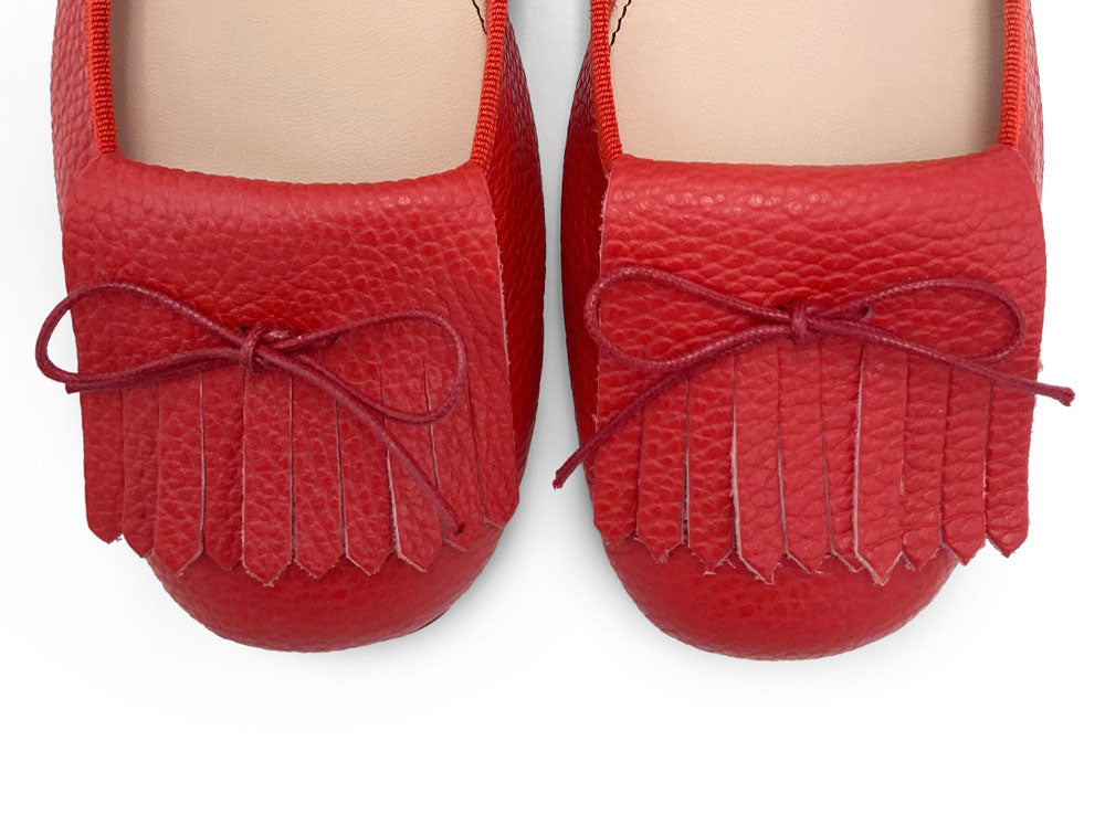 Women's strawberry red leather moccasins with fringes
