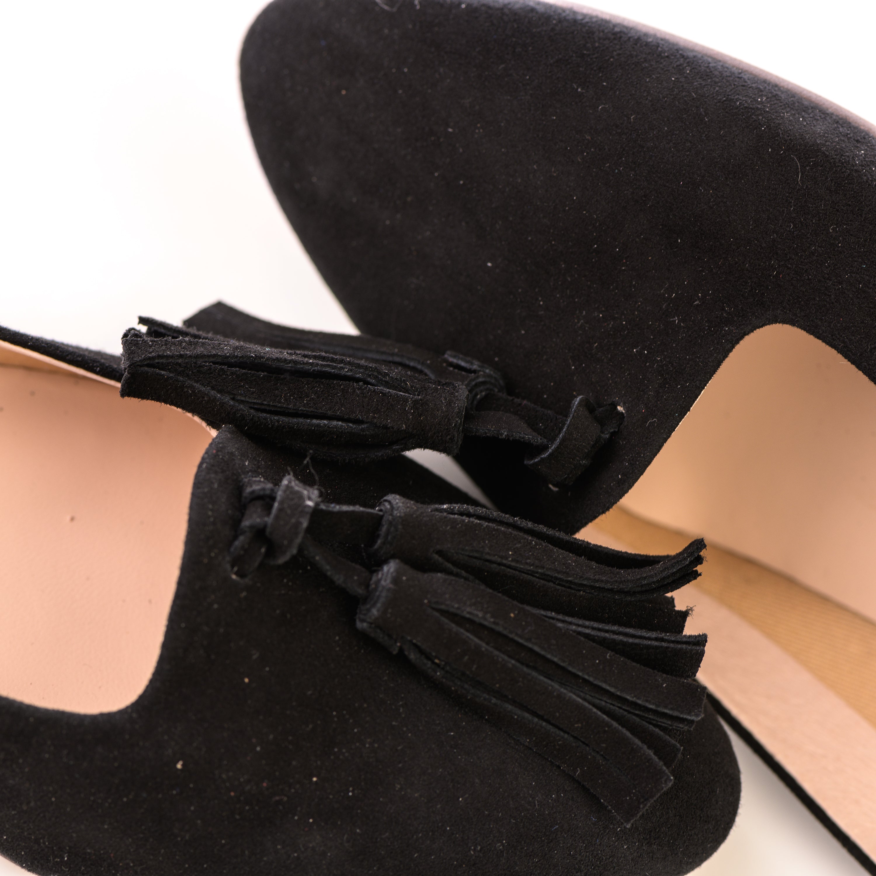 Black suede moccasins with tassels