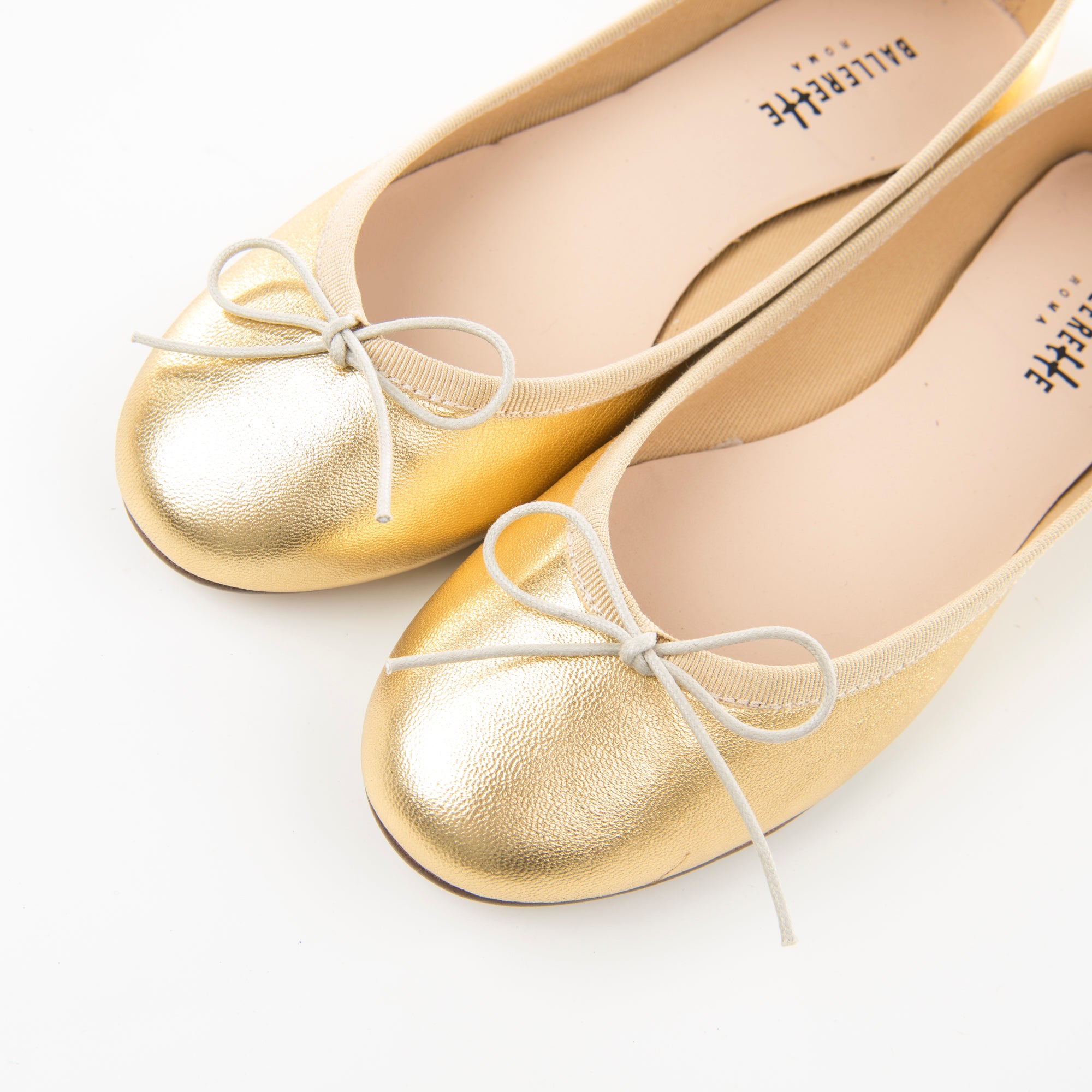 Gold metallic leather ballet flats