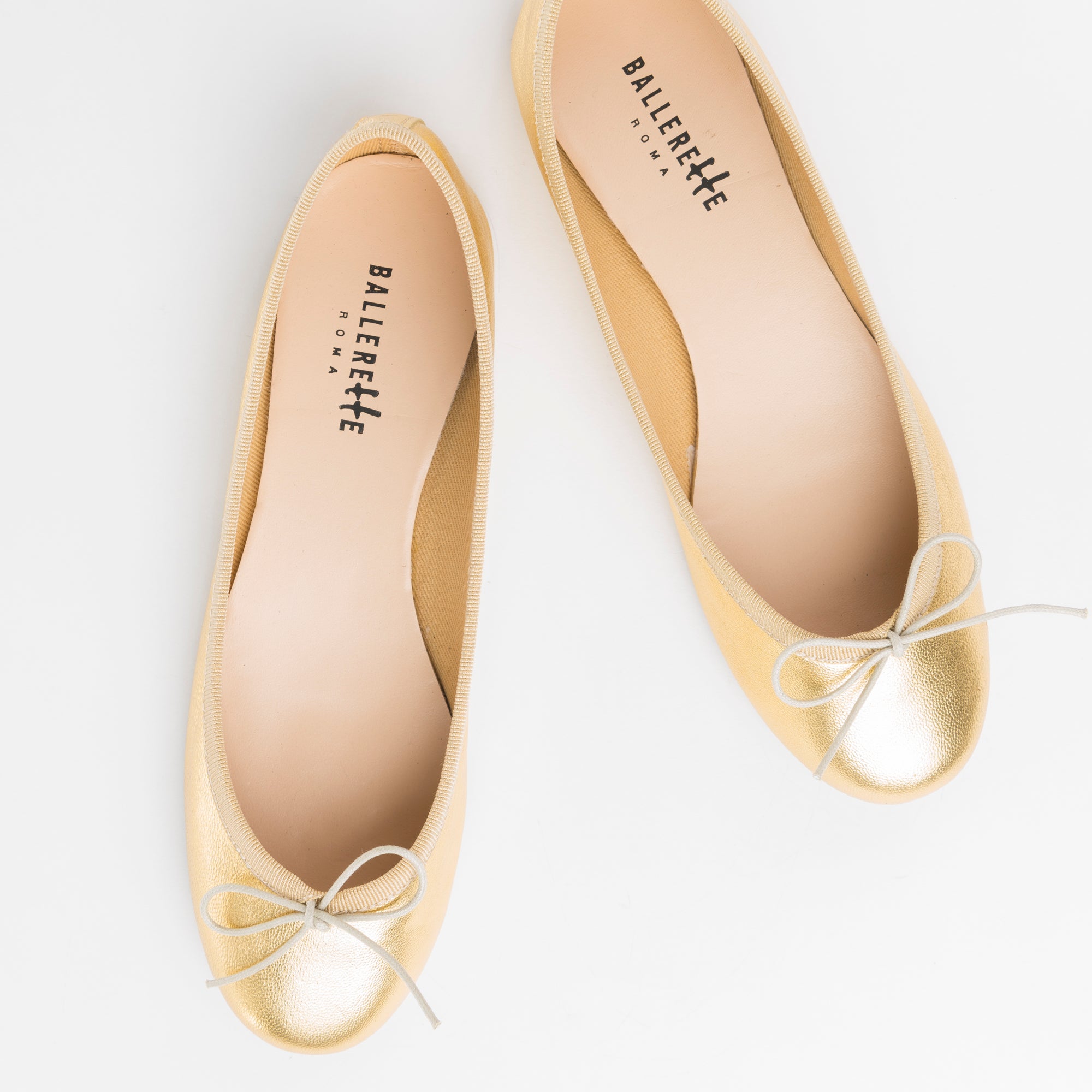 Gold metallic leather ballet flats