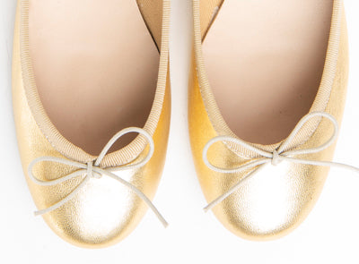 Gold metallic leather ballet flats