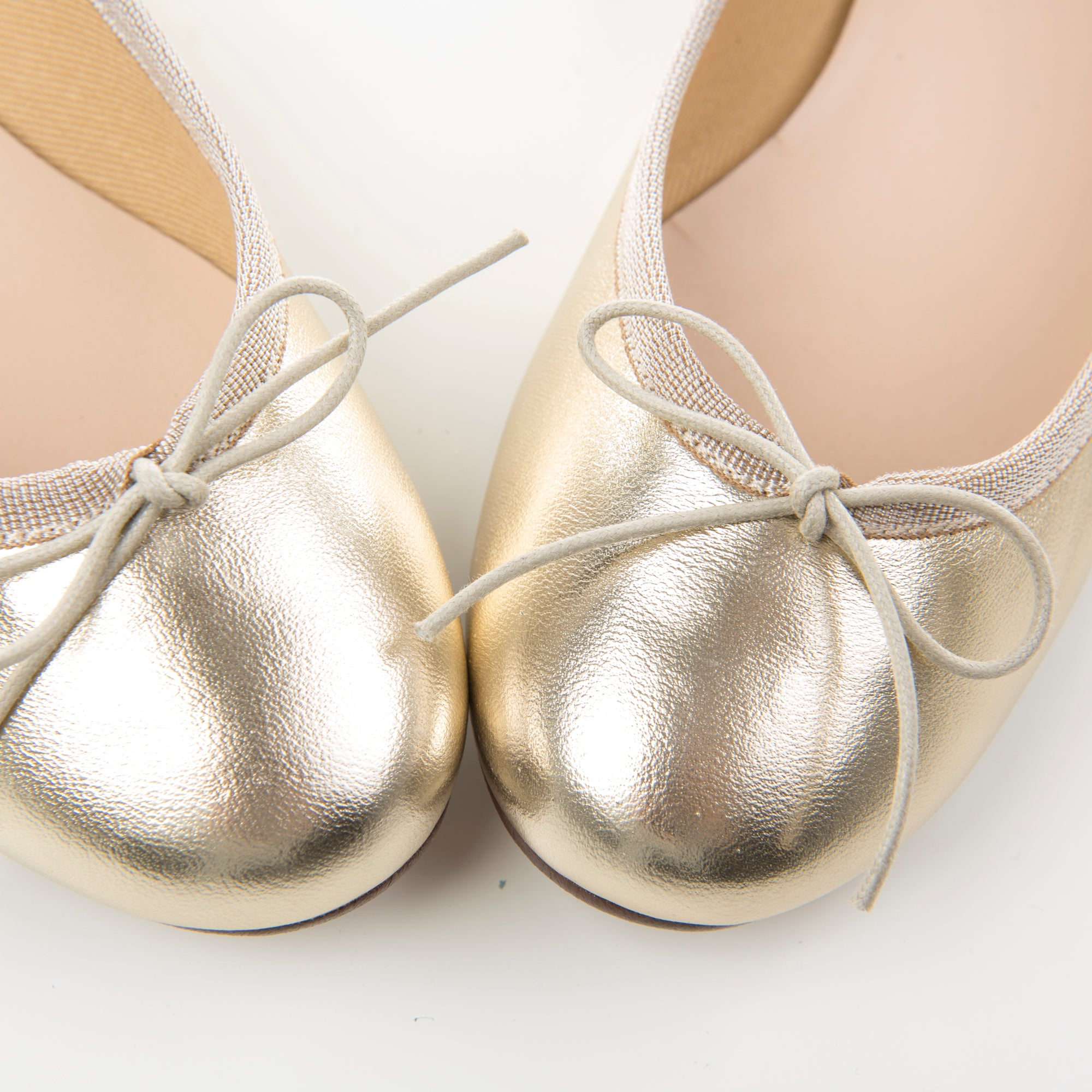 Platinum metallic leather ballet flats