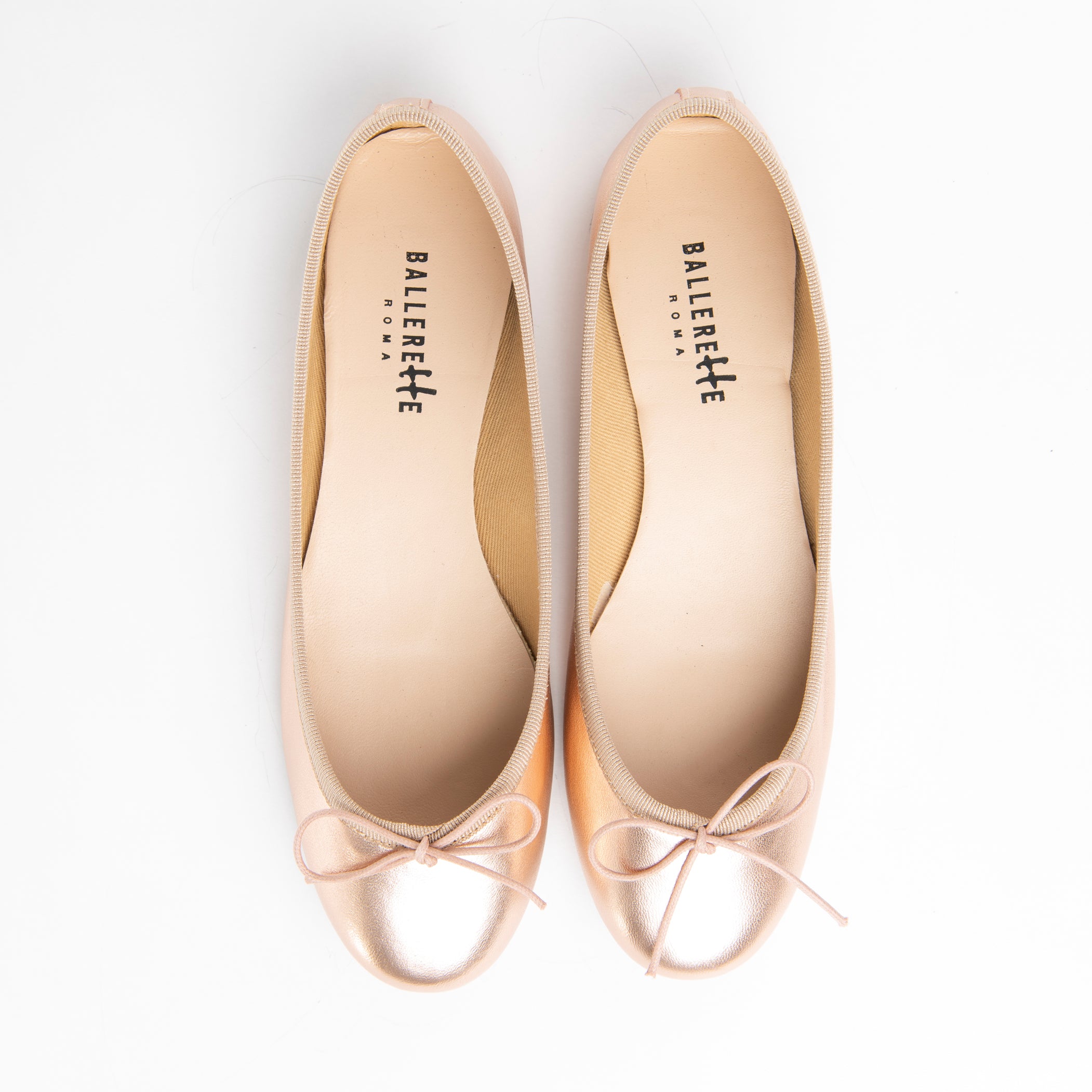 Metallic rose gold ballet flats