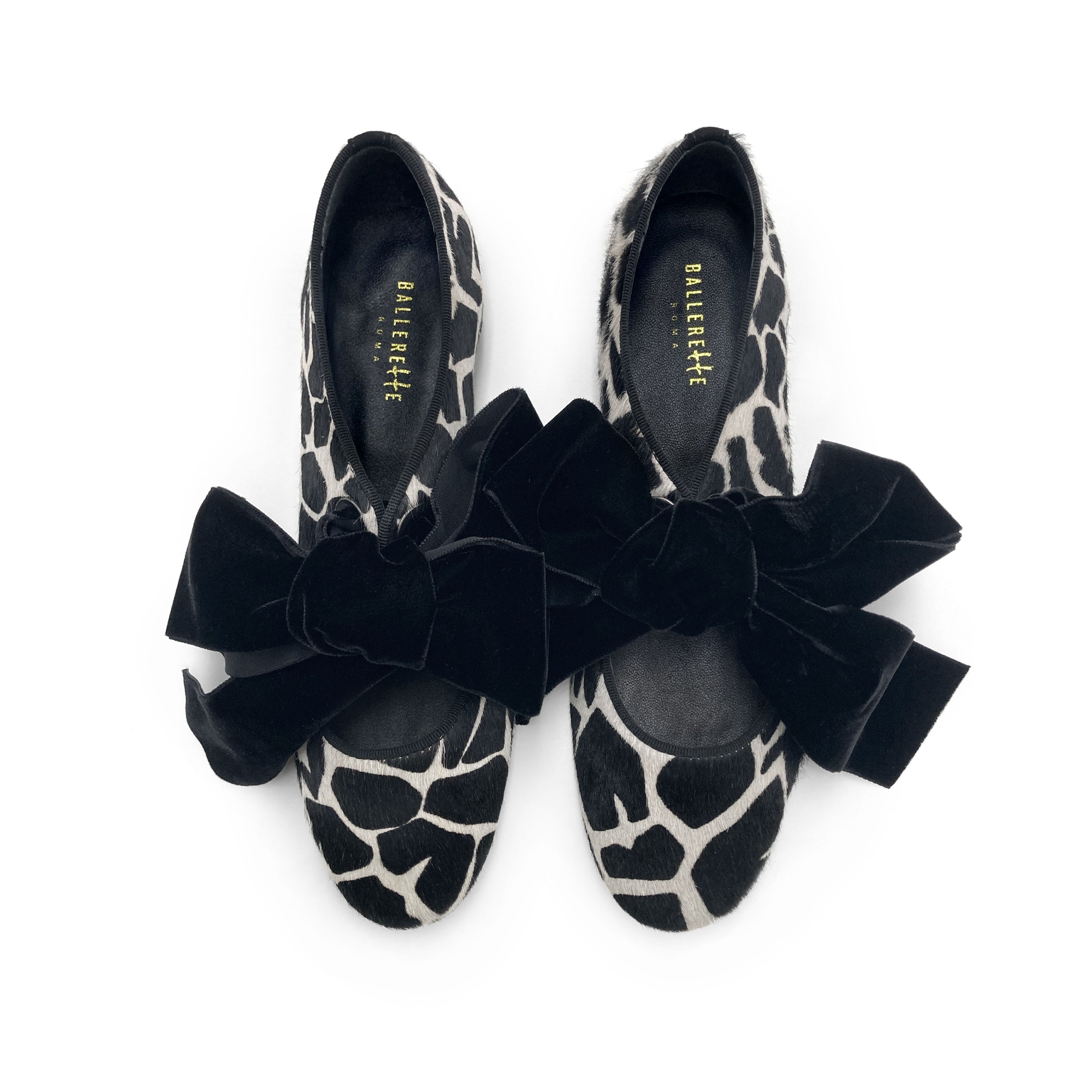 Women's black and white animal print moccasins