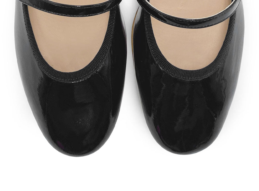 Black patent leather Mary Jane ballet flats with strap and heel