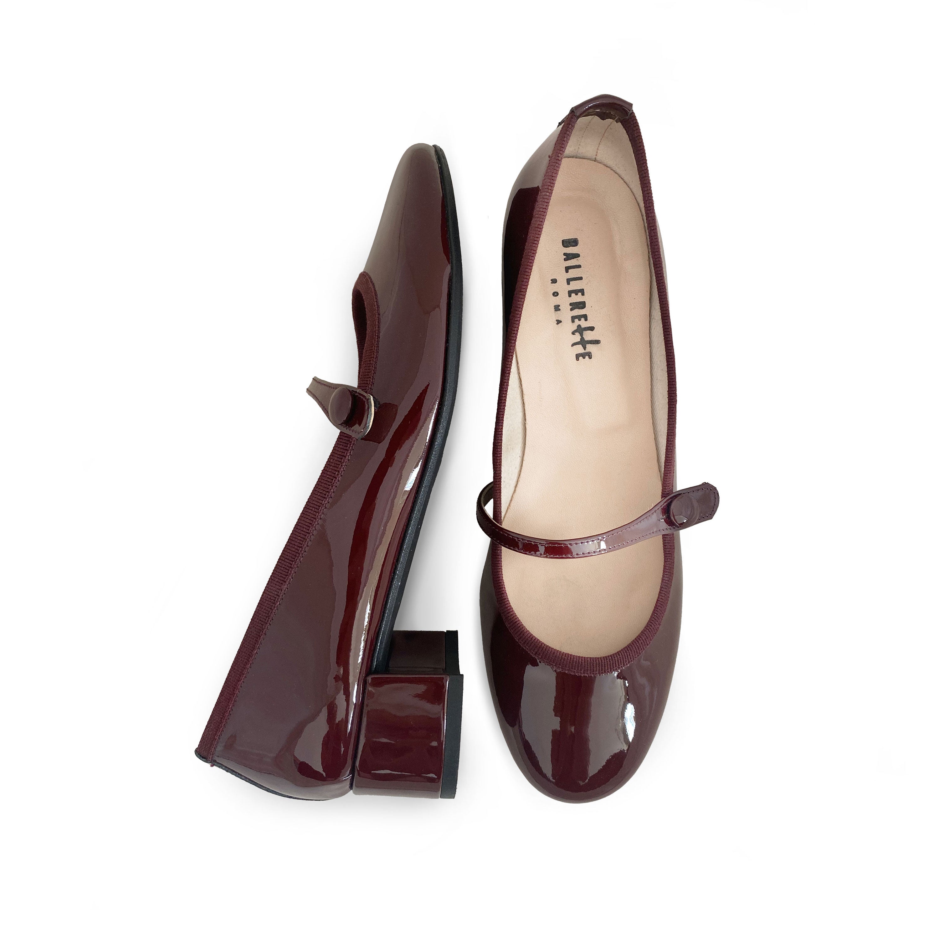 Burgundy patent leather Mary Jane ballet flats with strap and heel