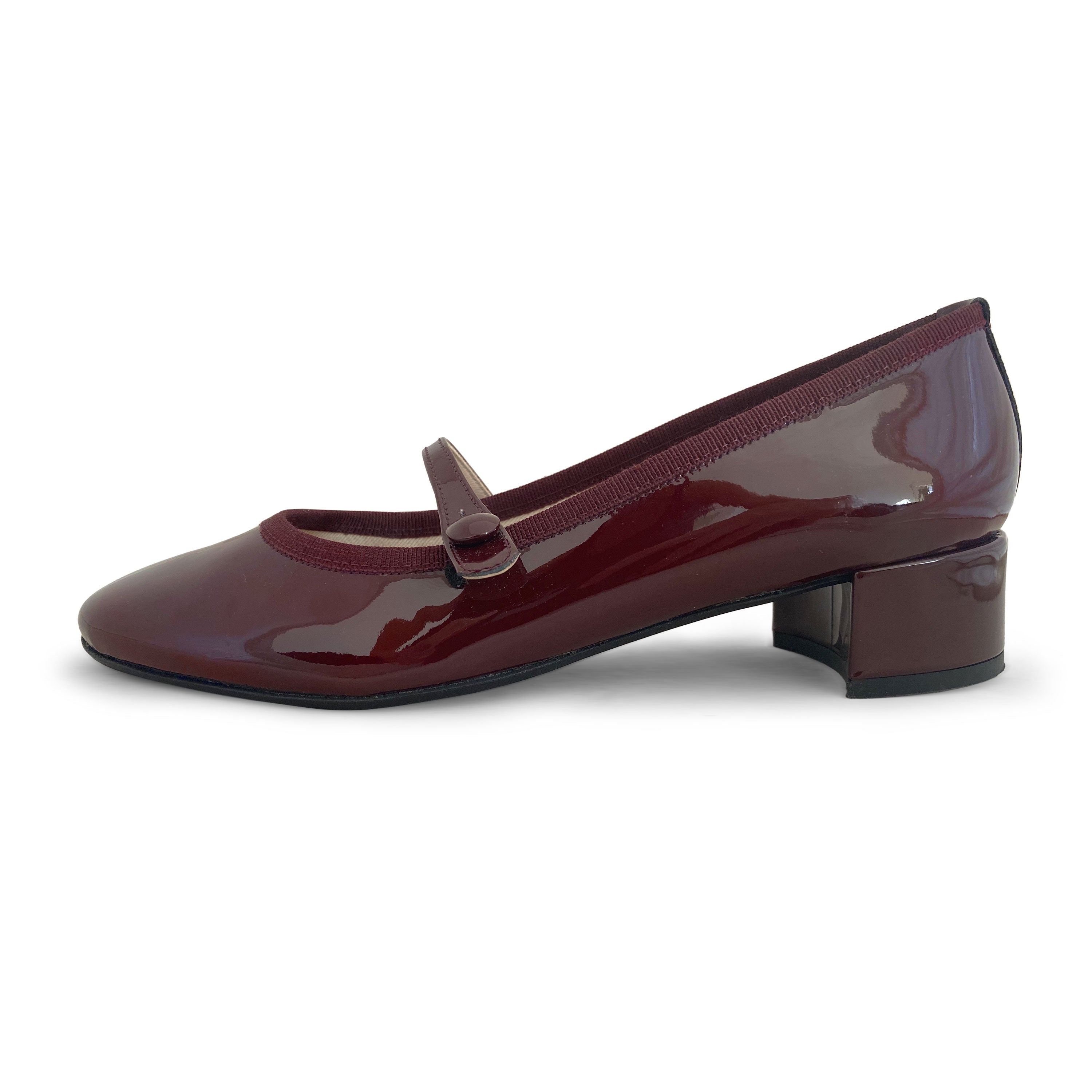 Burgundy patent leather Mary Jane ballet flats with strap and heel