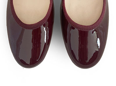 Burgundy patent leather Mary Jane ballet flats with strap and heel