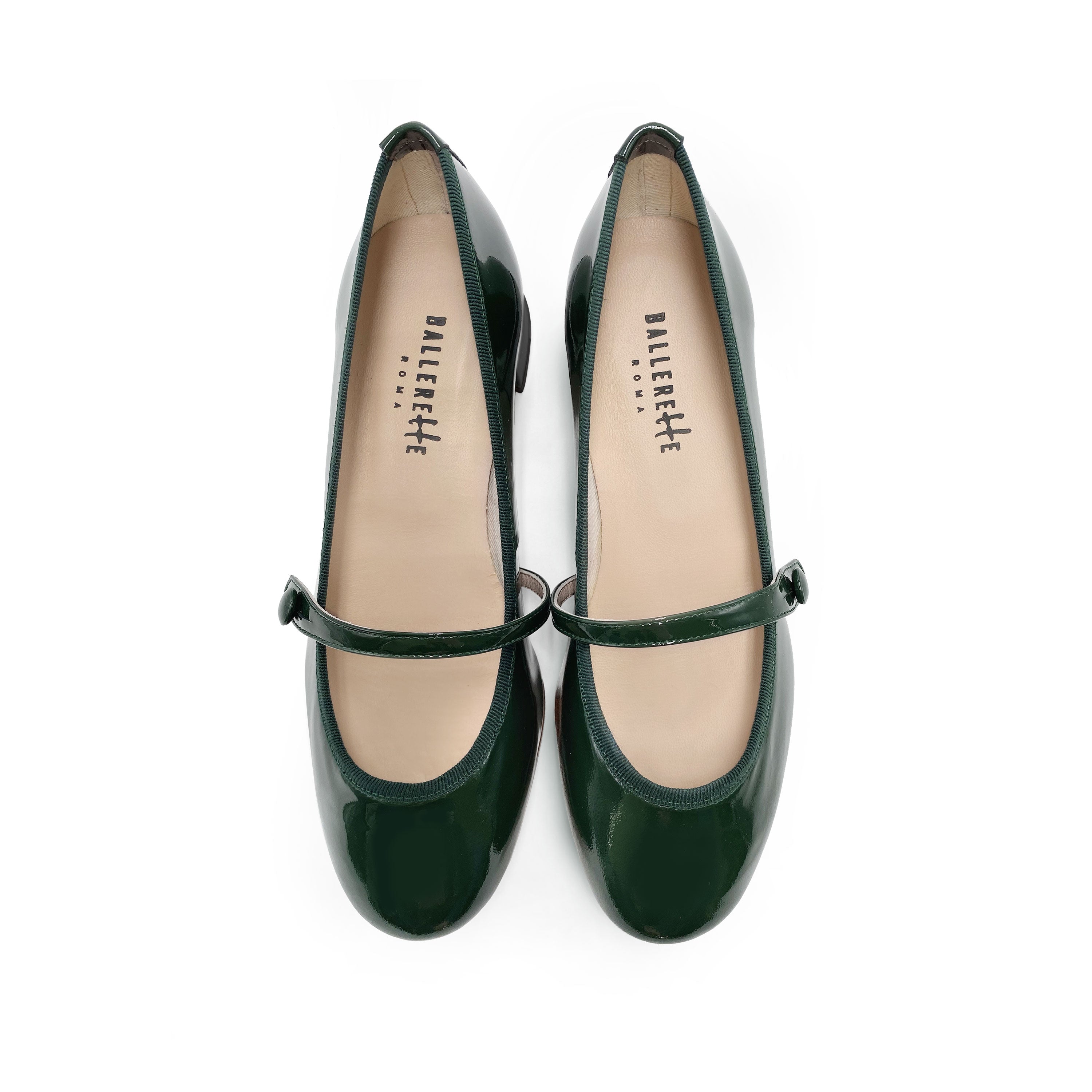 Green patent leather ballet flats with strap and heel