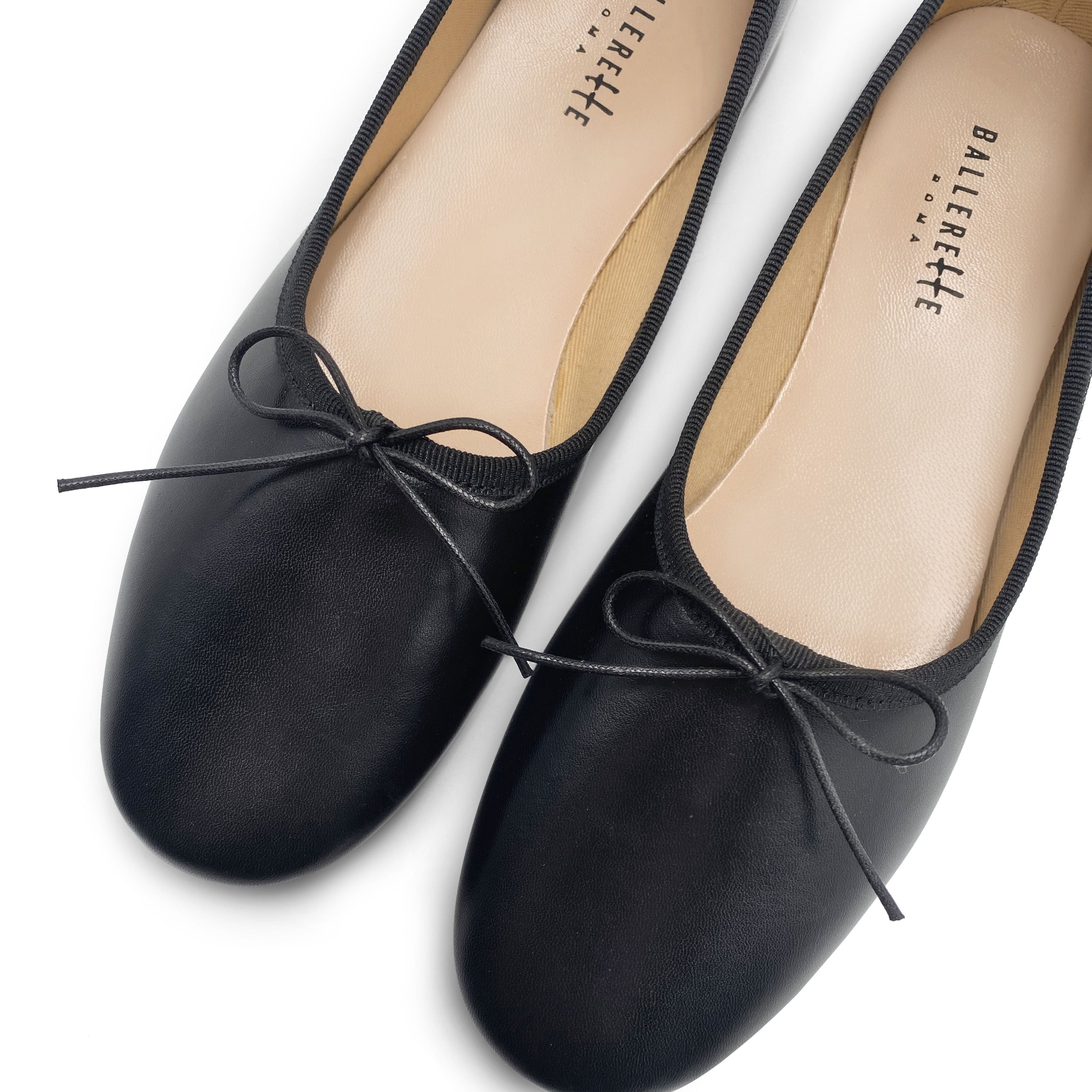 Black leather high-vamp "glove shoes" ballet flats