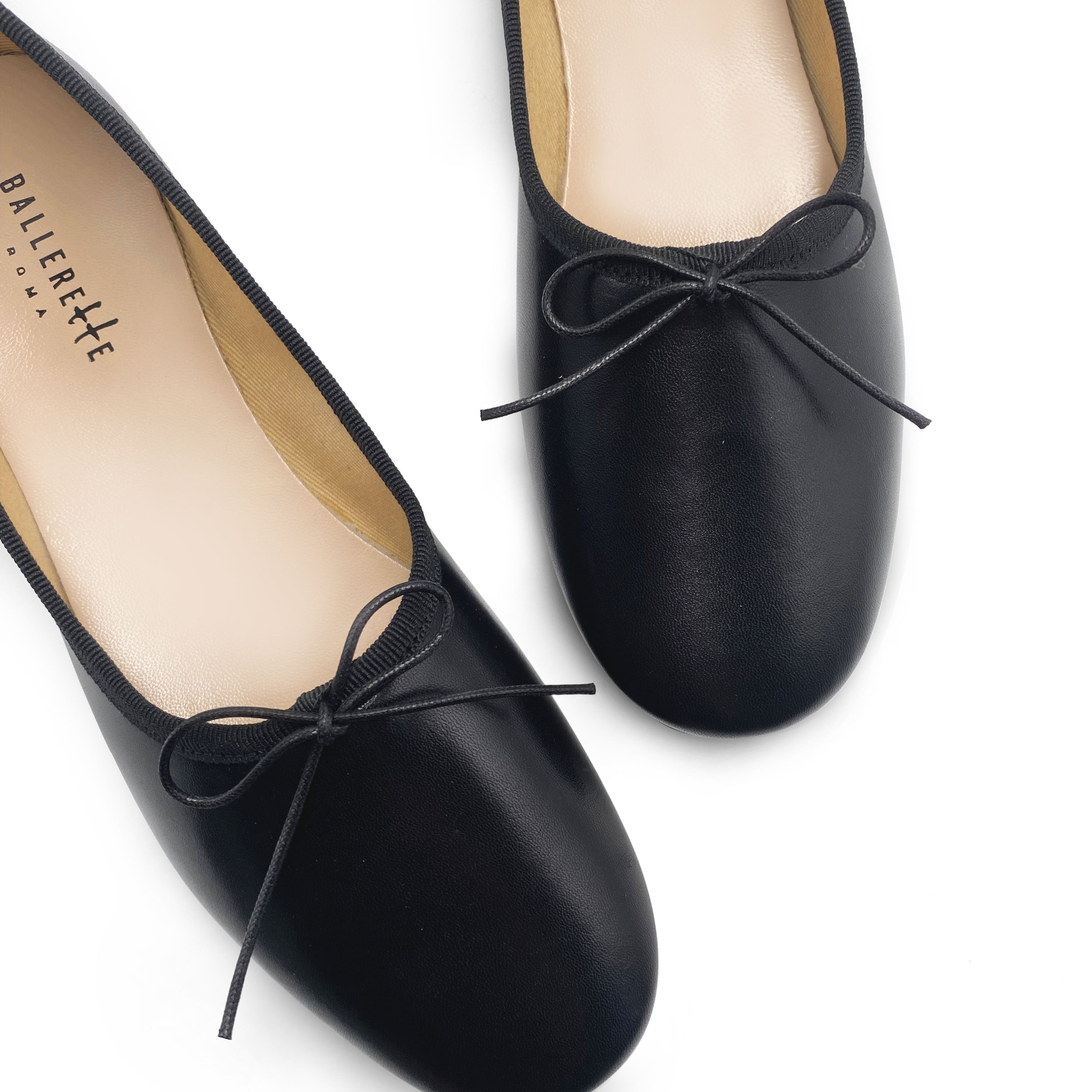 Black leather high-vamp "glove shoes" ballet flats