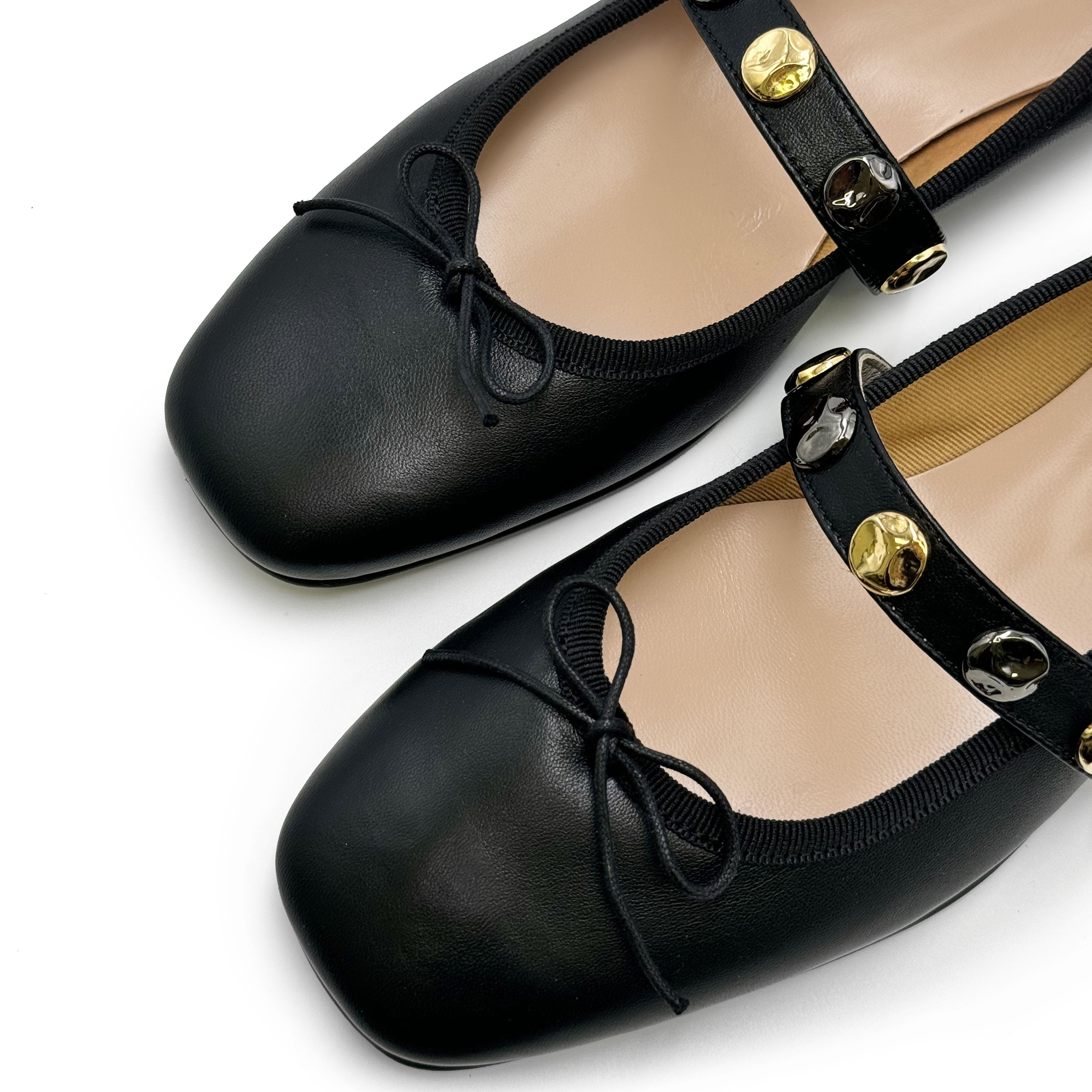 Black squared toe leather ballet flats with strap and studs