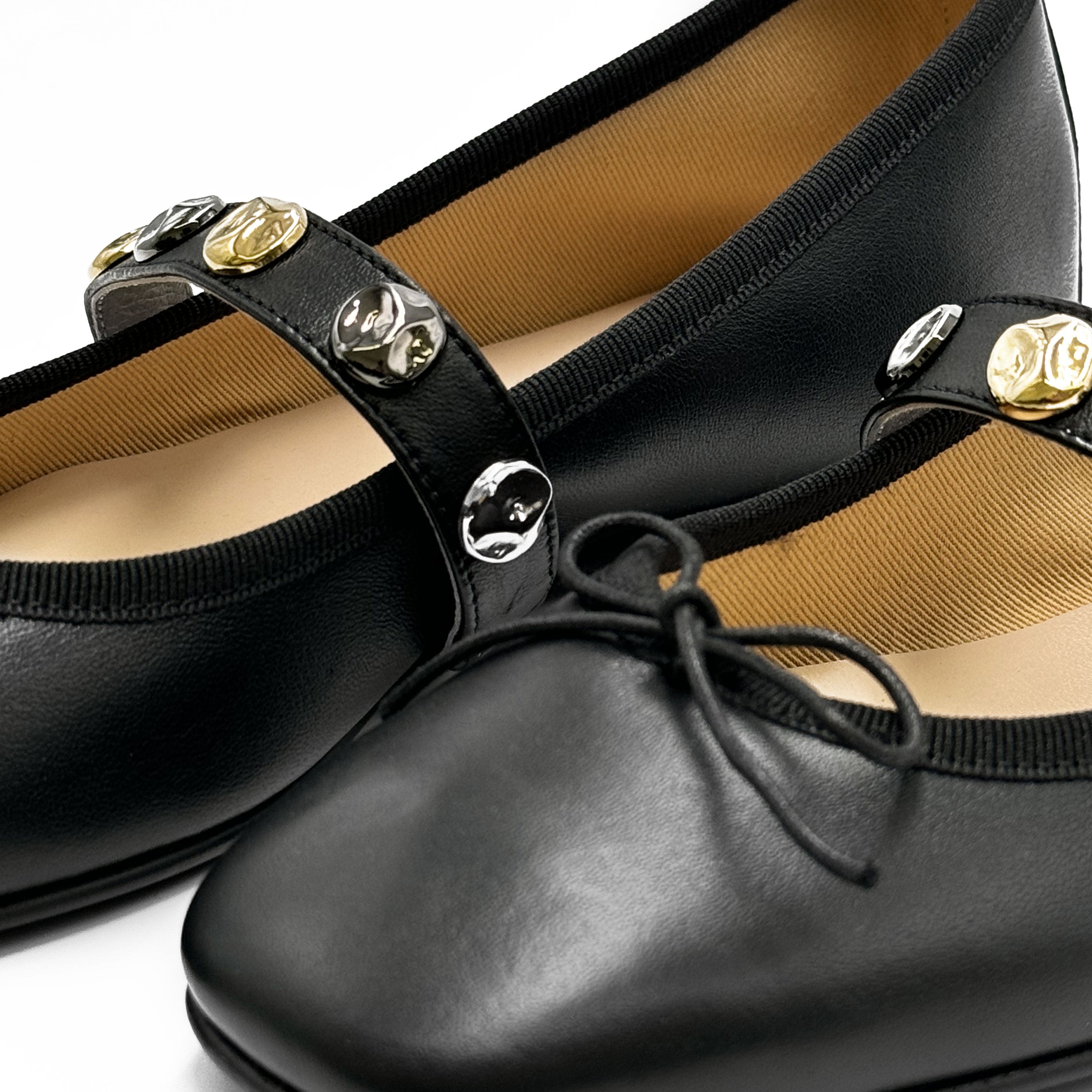 Black squared toe leather ballet flats with strap and studs