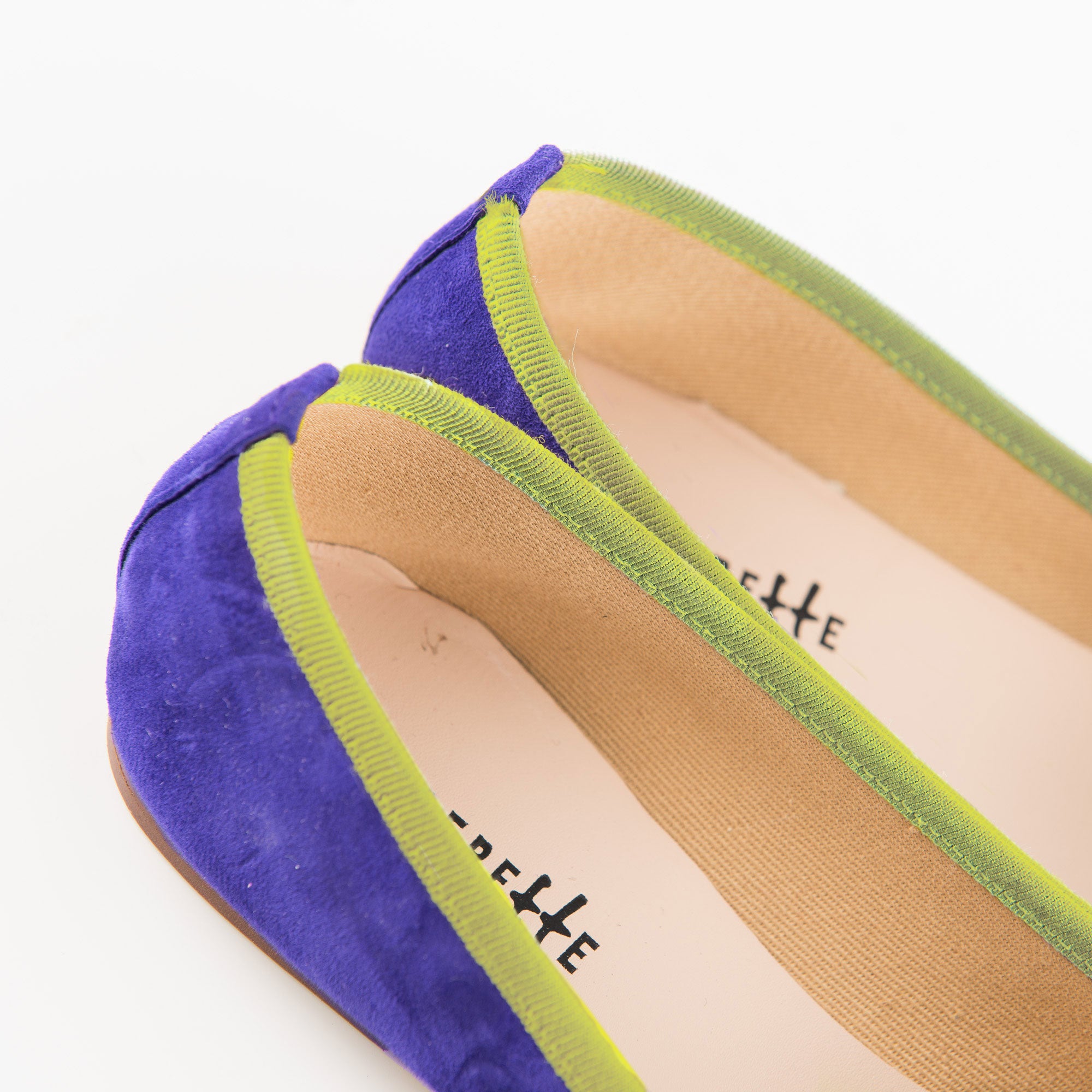 Purple suede loafers and green grosgrain