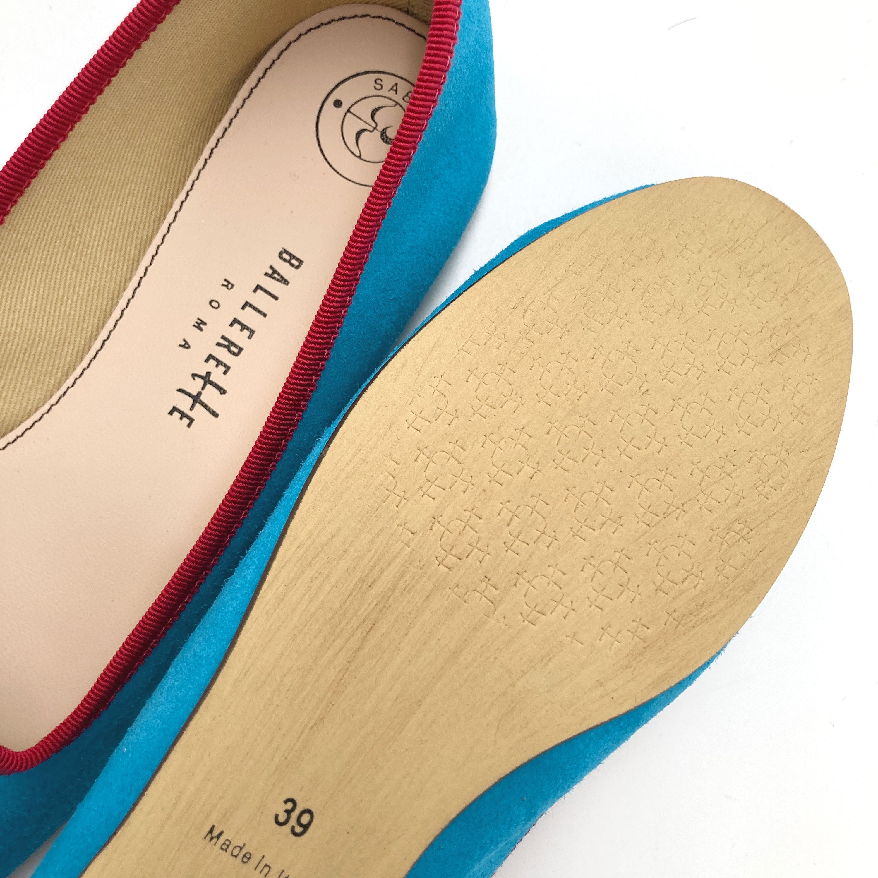 Women’s loafers in turquoise suede with fuchsia details