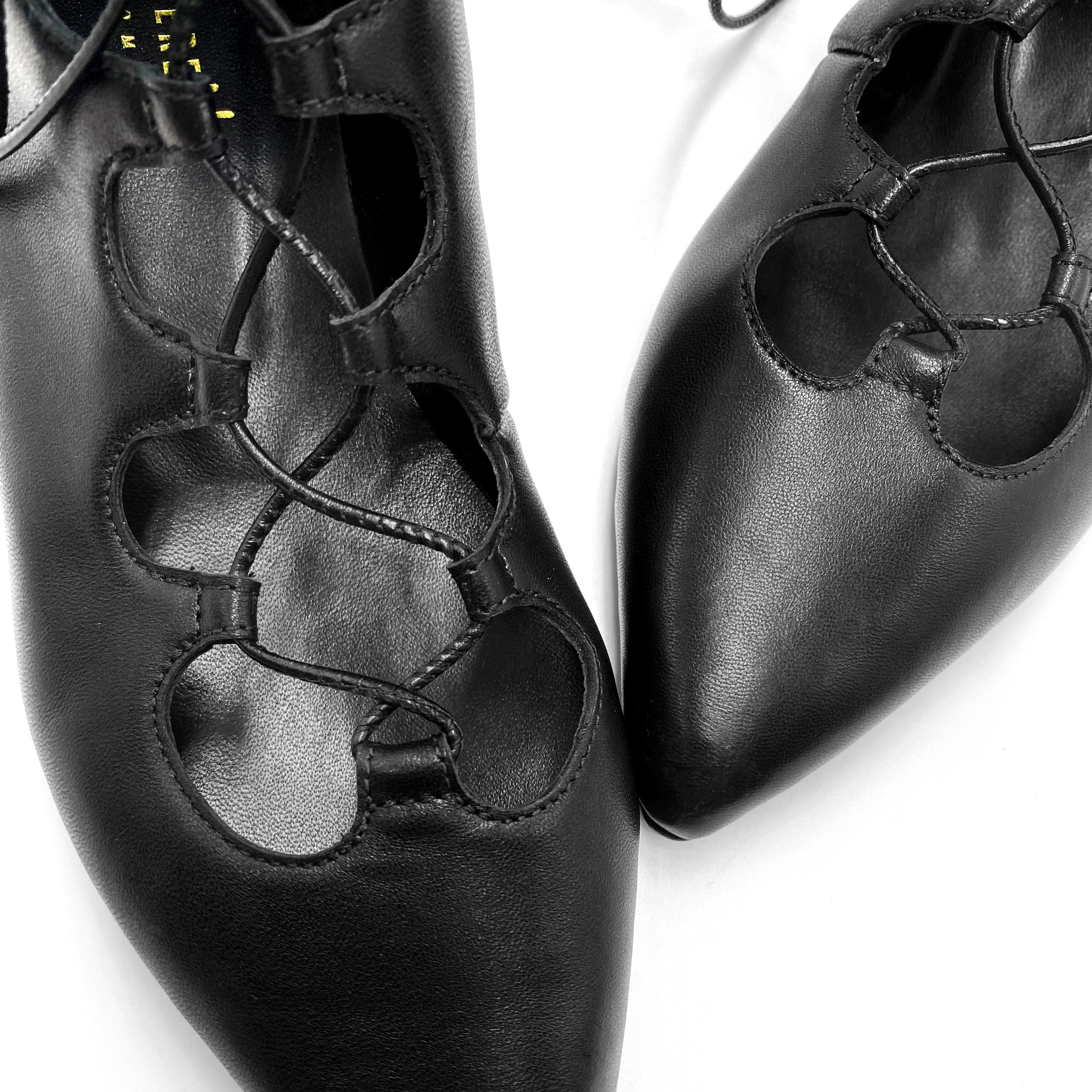 Black pointed ankle boots with laces
