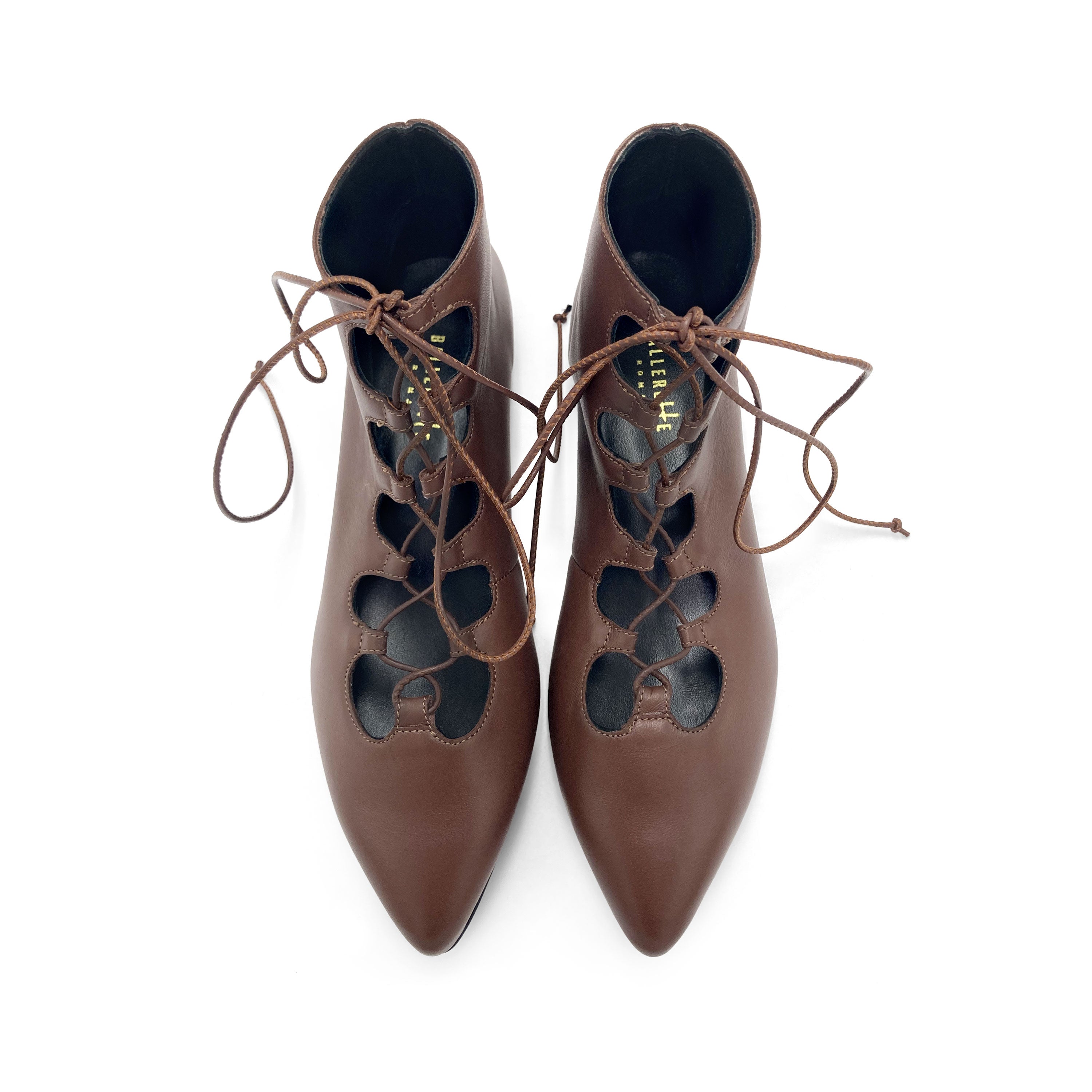 Brown pointed ankle boots with laces