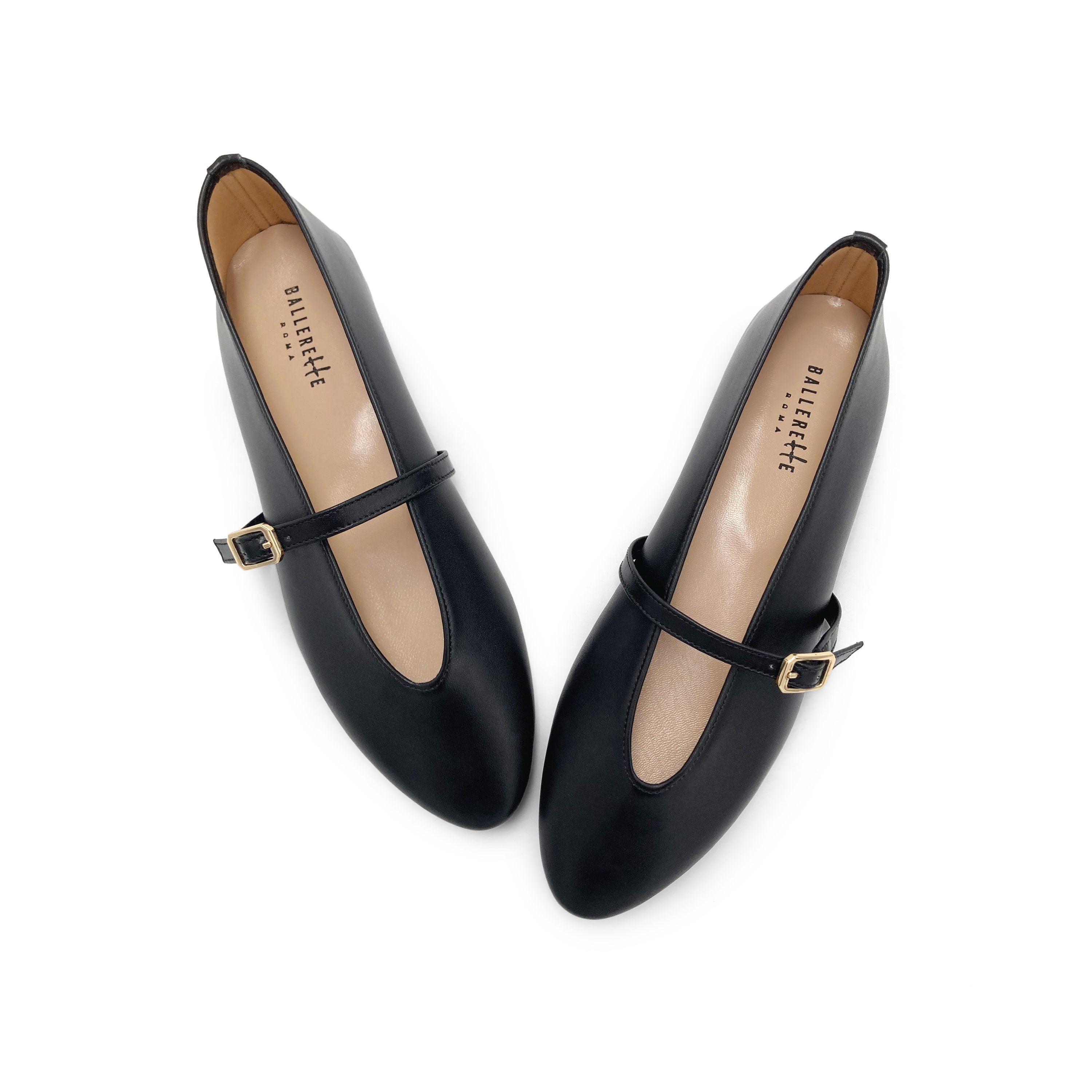 Black leather ballet flats with V-cut and strap