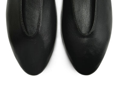 Black leather ballet flats with V-cut and strap