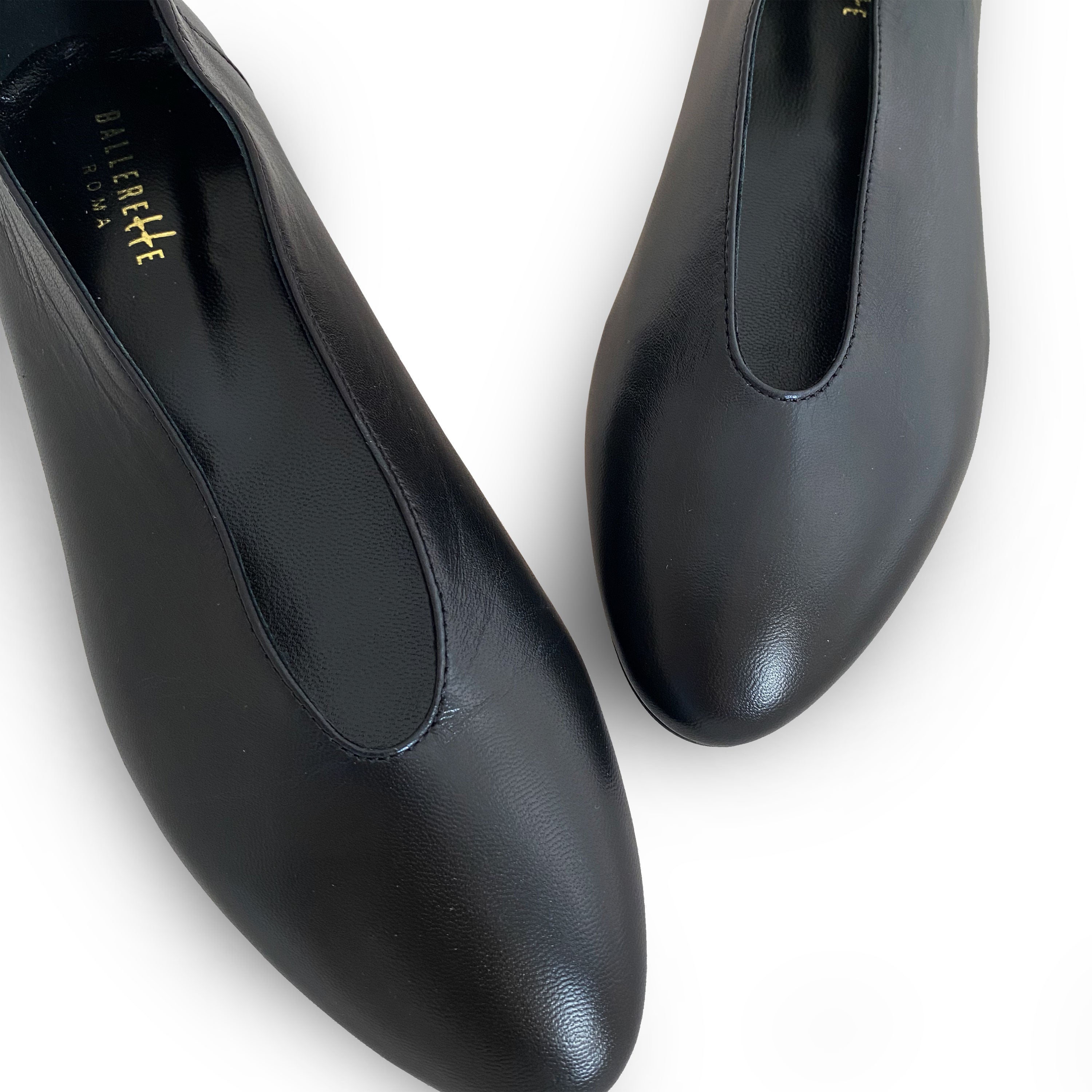 Black leather ballet flats with V-cut