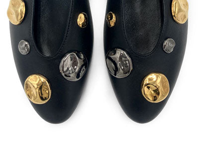 Black leather high shoe-vamp flats with gold and iron studs